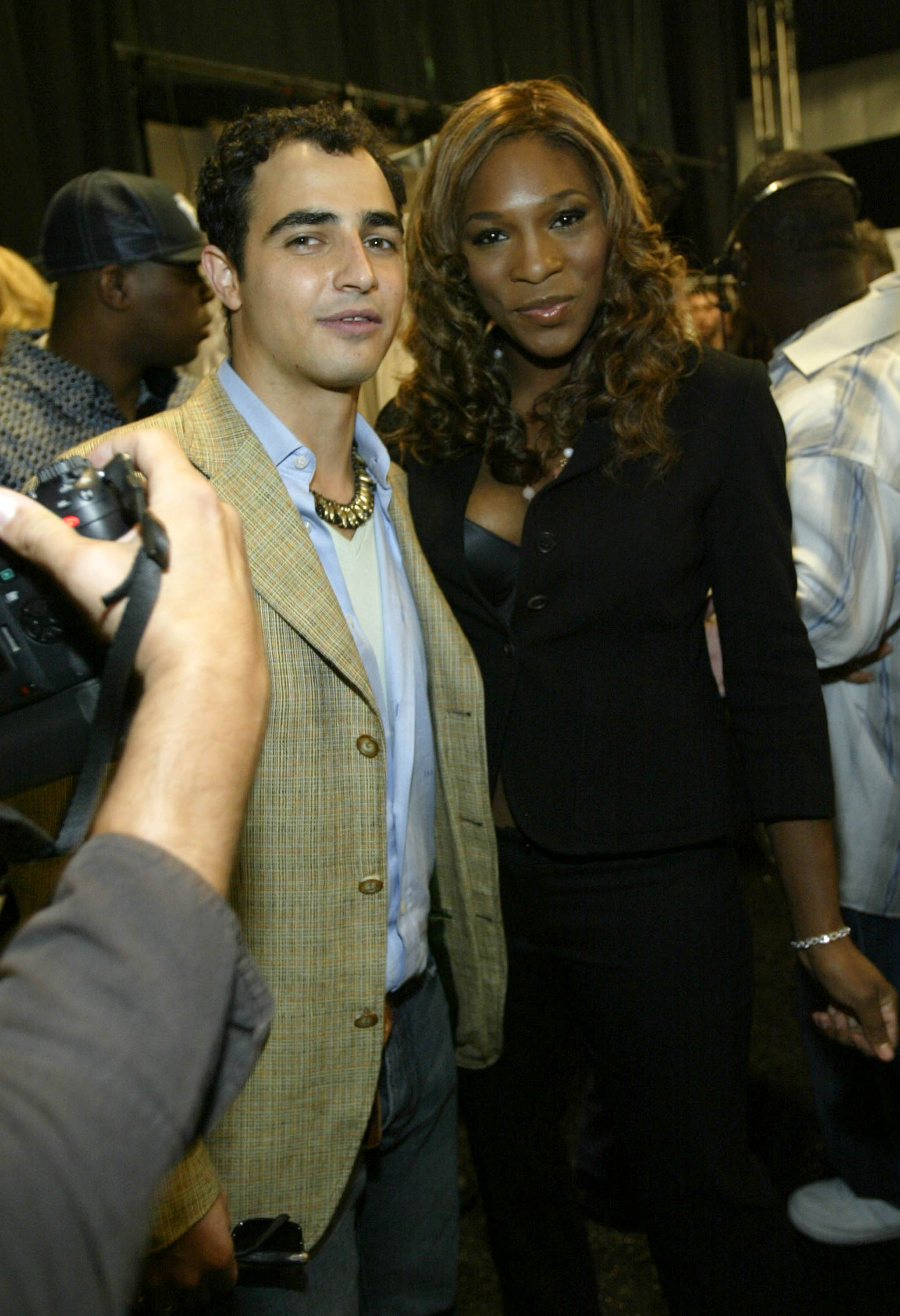 Zac Posen and tennis star Serena Williams pose for a photo backstage during the Zac Posen show during Olympus Fashion Week Spring 2005 at the Theatre in Bryant in September 2004. Photo: AFP