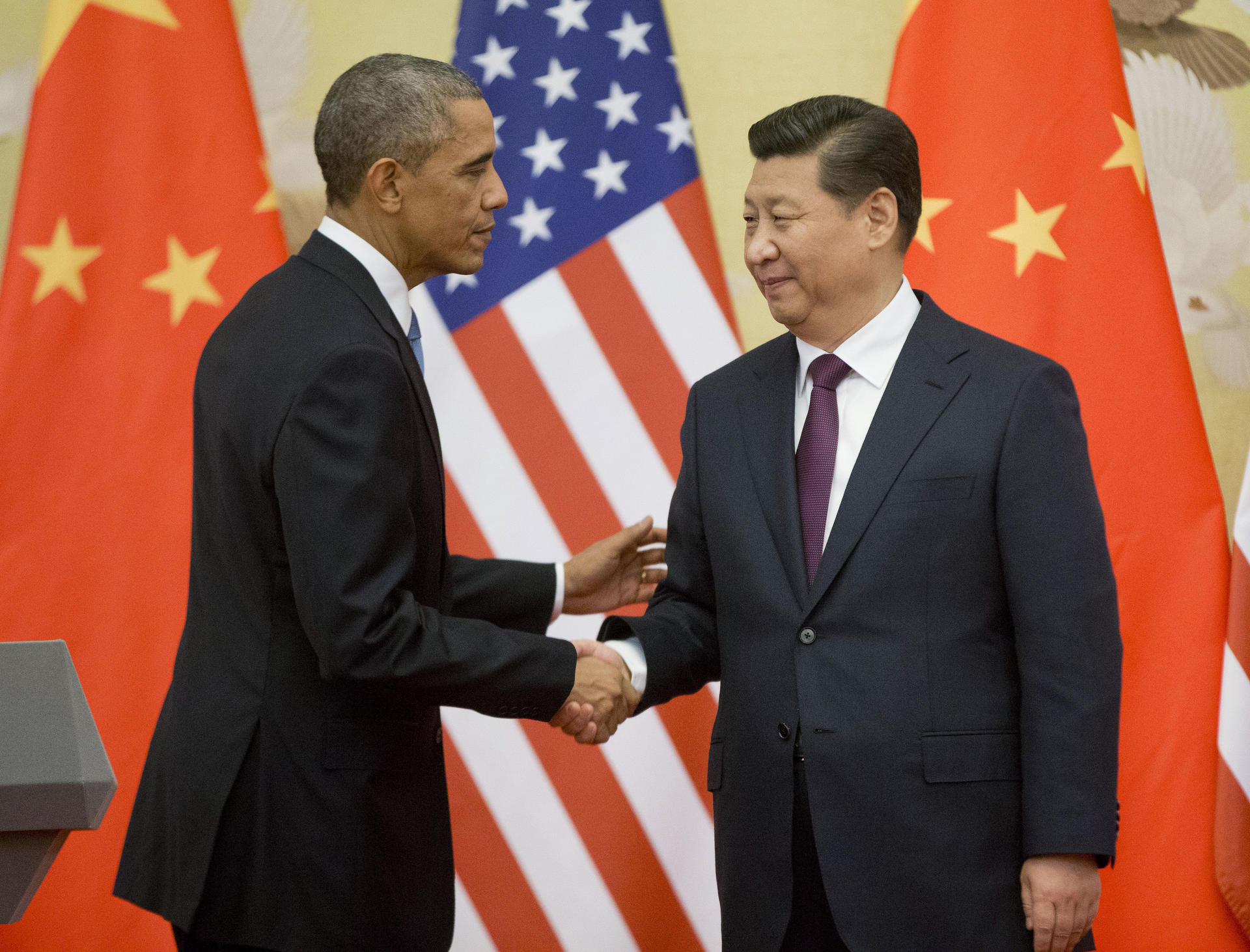 President Xi Jinping meets his US counterpart, Barack Obama, in Beijing. Photos: AP; AFP