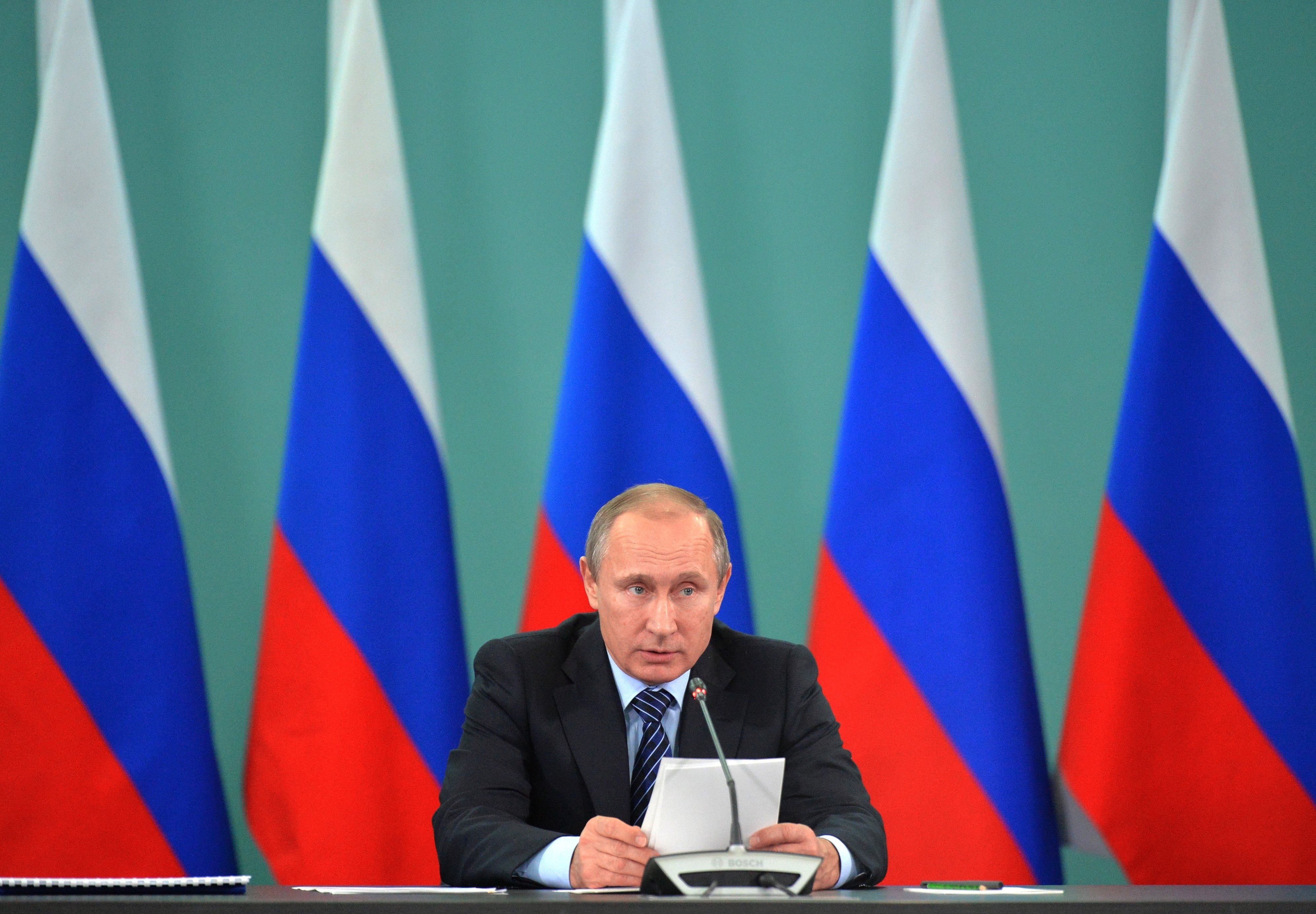 ALTERNATIVE CROP OF XAZ110 - Russian President Vladimir Putin speaks during his late-night meeting with the heads of Russia's sports federations in the Black Sea resort of Sochi, Russia, Wednesday, Nov. 11, 2015. Putin has ordered an investigation into allegations of widespread doping among the country’s sports figures. (Alexei Druzhinin, RIA-Novosti, Kremlin Pool Photo via AP)