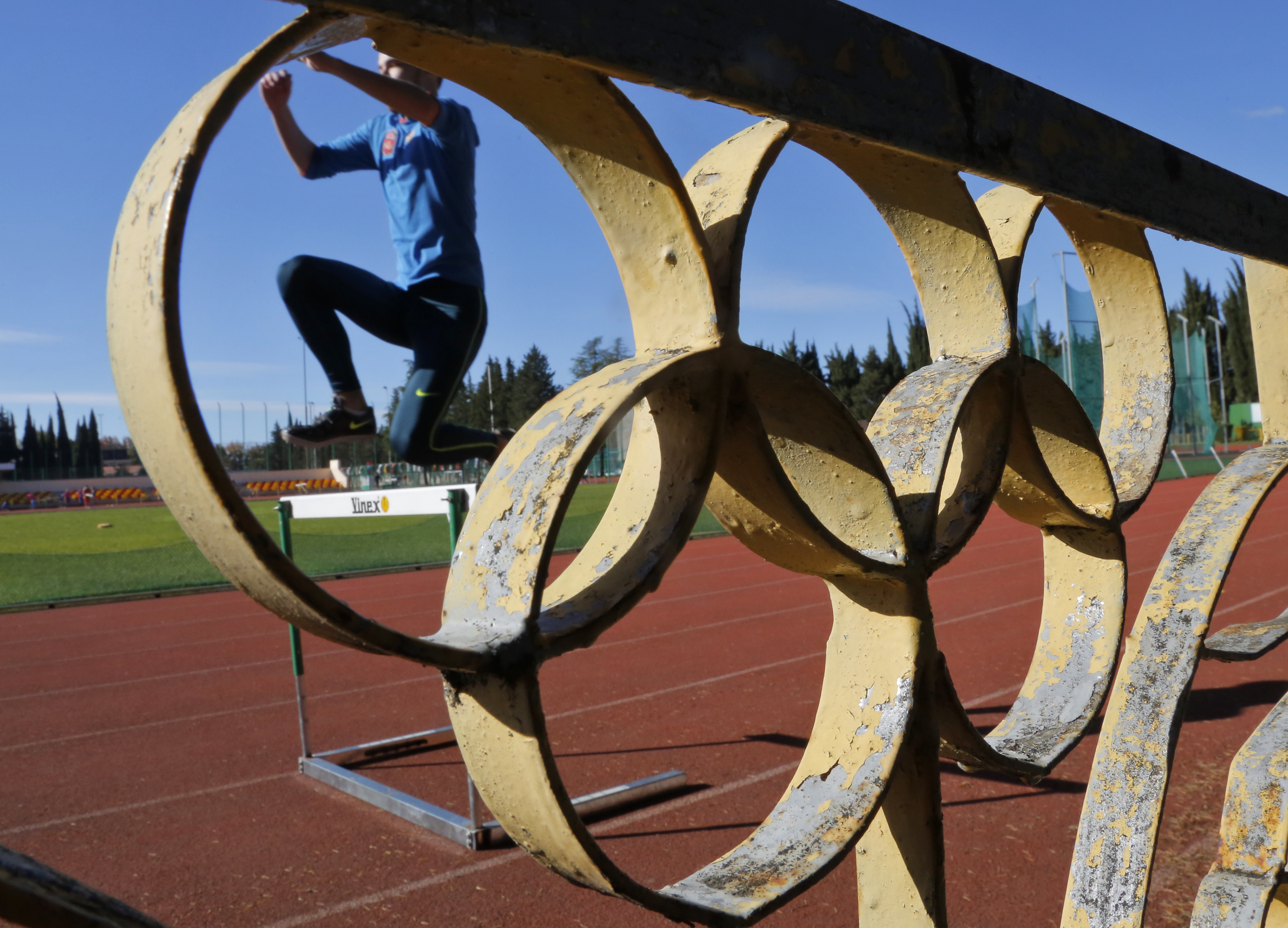 An athlete attends a training session at the ‘Yunost‘ sports ground at the Black Sea resort of Sochi, Russia, Thursday, Nov. 12, 2015. Facing allegations that Russia engages in extensive, state-sponsored doping, President Vladimir Putin on Wednesday called on sports officials to carry out an internal investigation - but said that clean athletes shouldn't be punished for the actions of those who take banned drugs. Sports are a substantial piece of Russia's self-esteem -- both in athletes' performances and its ability to host huge international events. AP Photo/Dmitry Lovetsky)