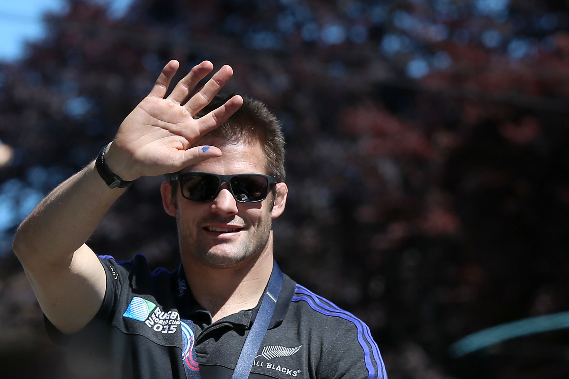(FILES) - A file picture taken on November 5, 2015, New Zealand's All Blacks rugby team captain Richie McCaw arrives at an official welcome parade and reception for the team in Christchurch, following their Rugby World Cup win against Australia in England on October 31. All Black skipper Richie McCaw announced his retirement on November 18, 2015. AFP PHOTO / Fiona GOODALL