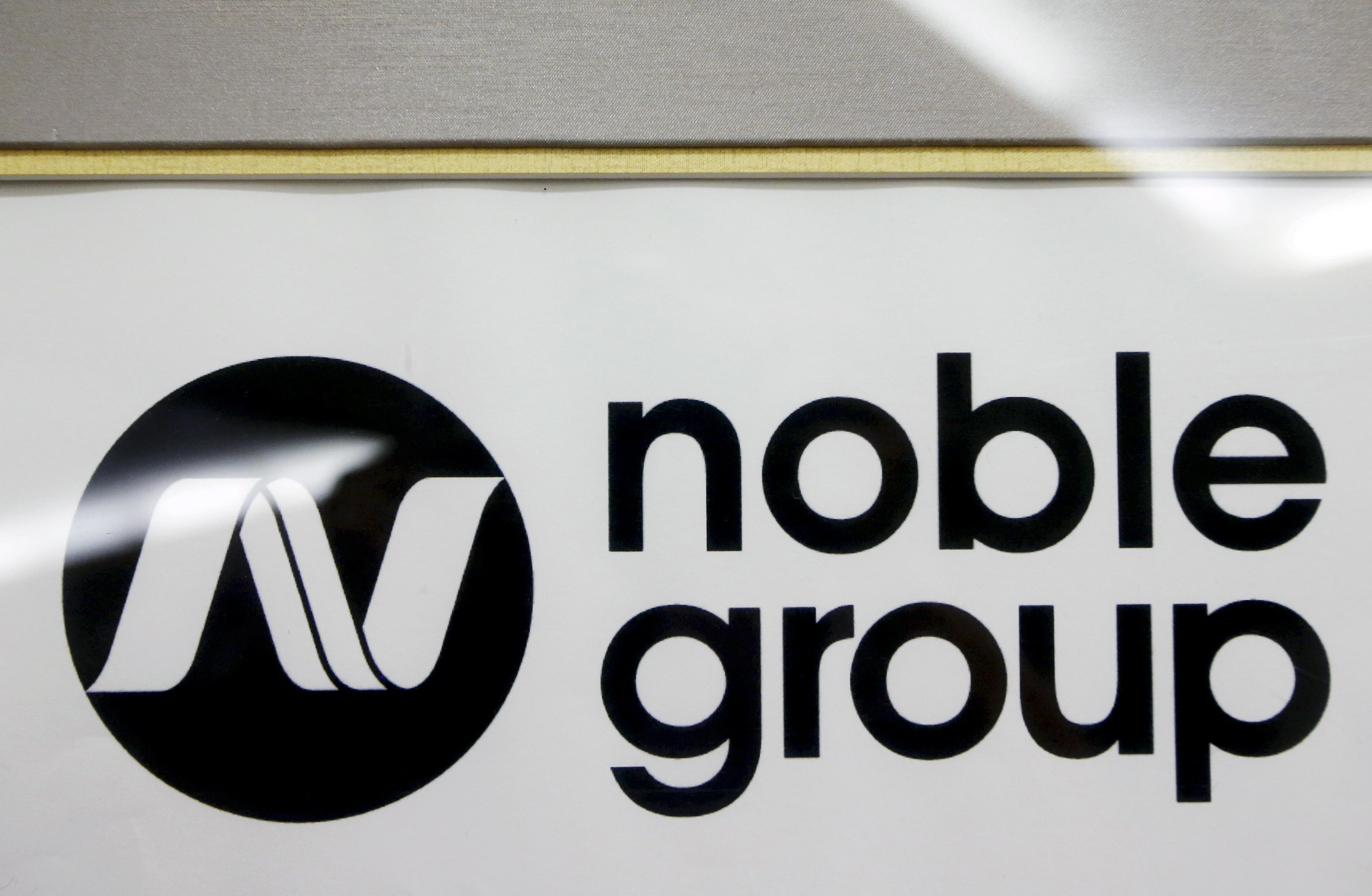 A Noble Group sign is pictured at a meet-the-investors event in Singapore in this August 17, 2015 file photo. REUTERS/Edgar Su/Files