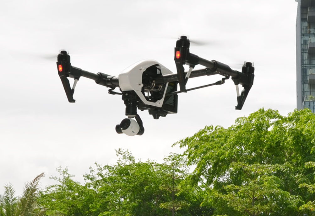A drone made by Chinese drone maker DJI flies in Shenzhen, Guangdong Province, China, on May 29, 2015. According to media reports, DJI sold about 400,000 units of drone in 2014. (Kyodo) ==Kyodo