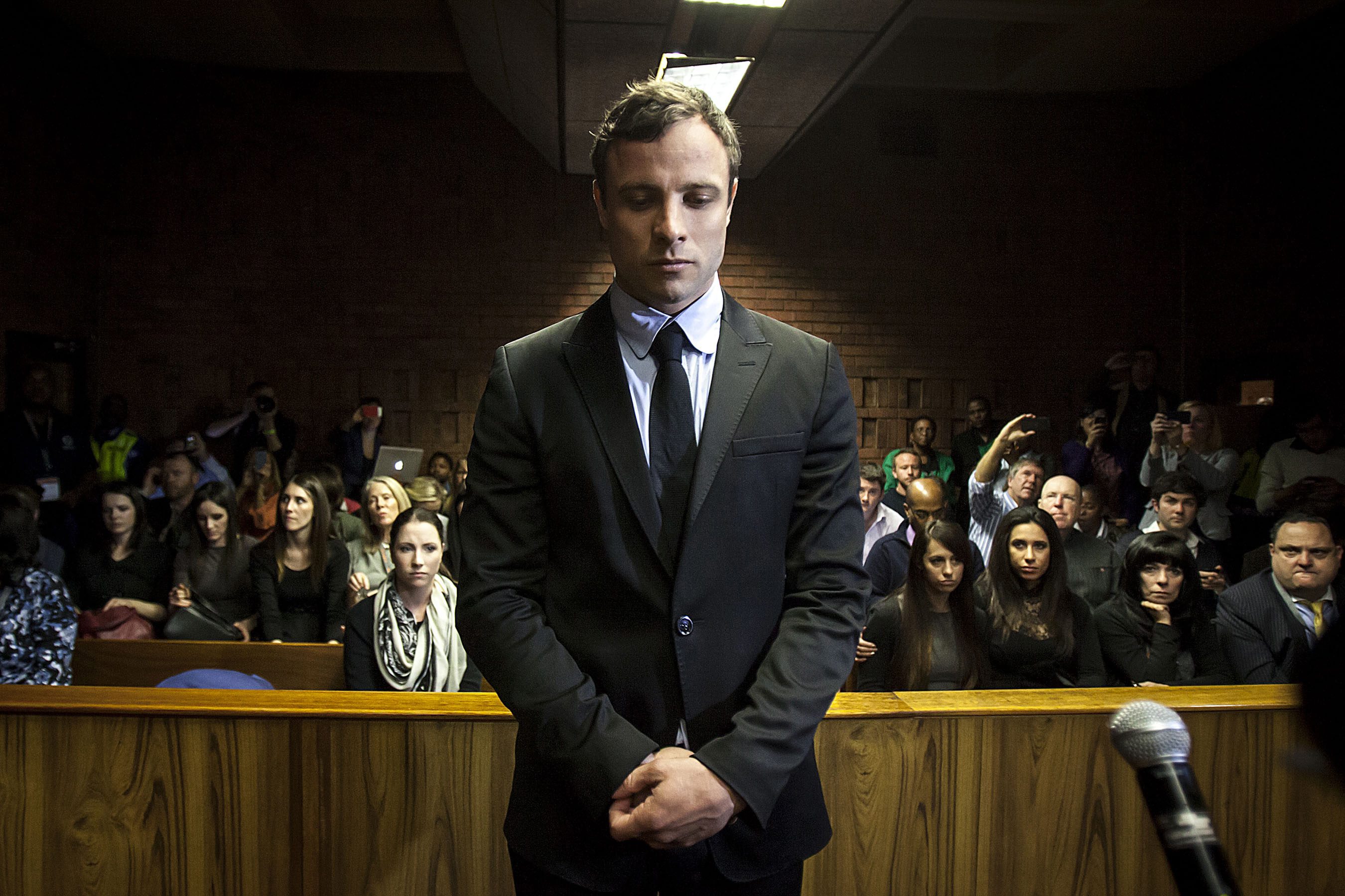 epa05052664 (FILE) A file picture dated 19 August 2013 shows South African Paralympic athlete Oscar Pistorius as he appears in the Pretoria Magistrates court in Pretoria, South Africa. Oscar Pistorius will have to return to prison after South Africa's Supreme Court of Appeals found him guilty on 03 December 2015 of murdering his girlfriend in 2013. The decision sets aside a 2014 verdict by a Pretoria court that found Pistorius guilty of culpable homicide. EPA/STR *** Local Caption *** 52313304