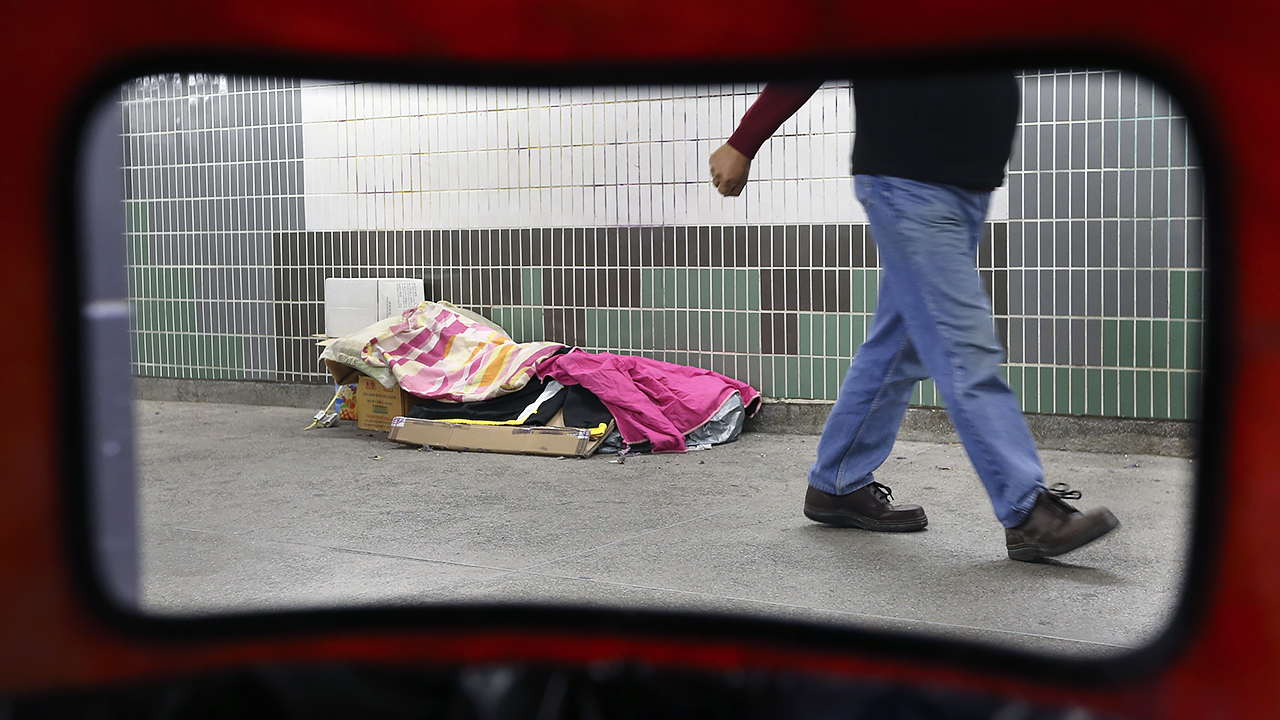 Homeless people getting their shelter inside the subway in Causeway Bay. 10JAN16, SCMP/Felix Wong