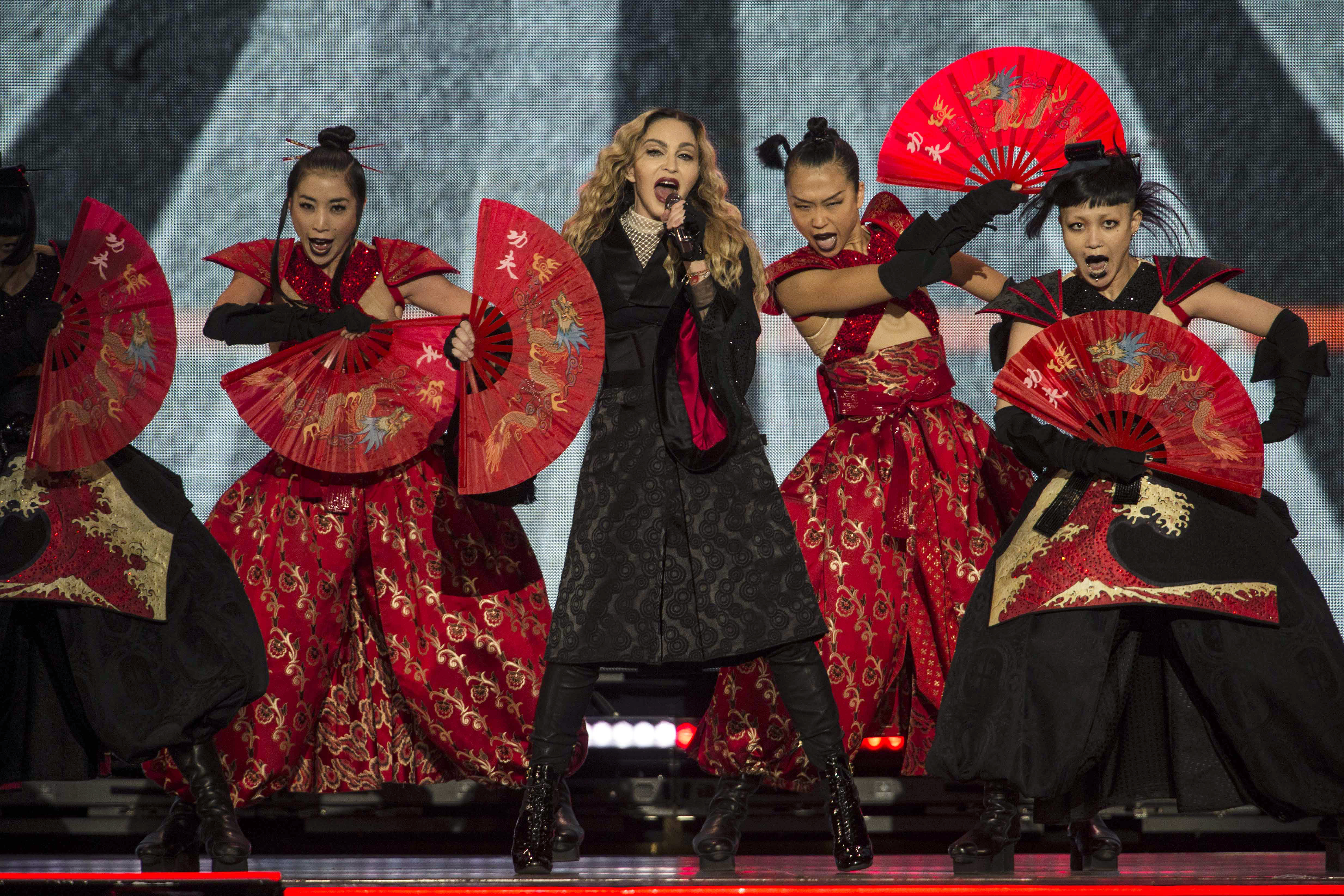 Madonna, center, performs in concert with dancers during her "Rebel Heart Tour" in Mexico City, Wednesday, Jan. 6, 2016. (AP Photo/Christian Palma)