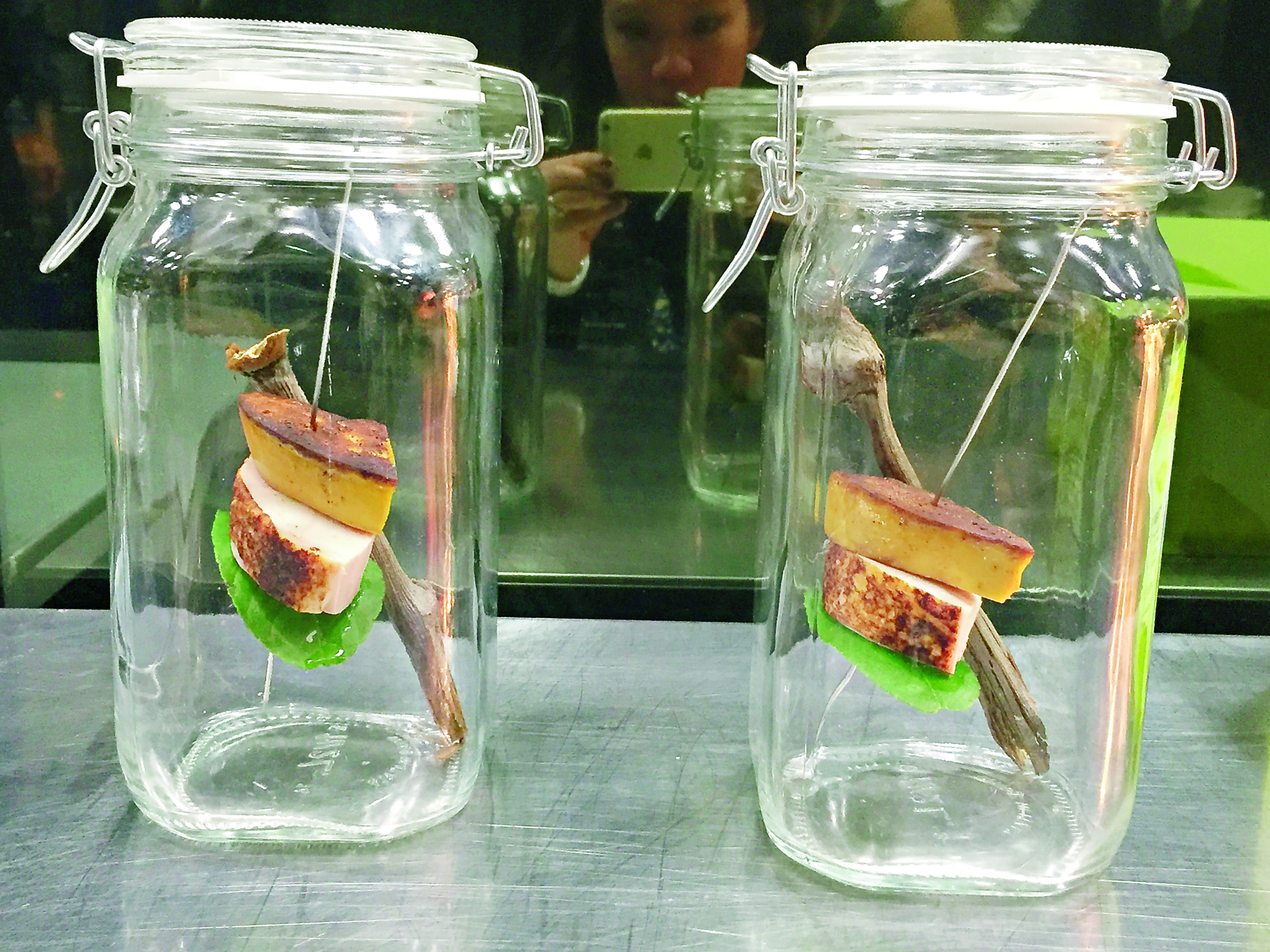 ***ONE TIME USE ONLY, PLEASE CLEAR THE COPYRIGHTS BEFORE RE-USE - OTUO*** This handout image shows chicken in a Jar served underneath a slice of foie gras, which has been smoked by Ultraviolet chef Paul Pairet in Shanghai. Photo / Juliana Loh [05FEBRUARY2016 FEATURES FOOD & WINE]