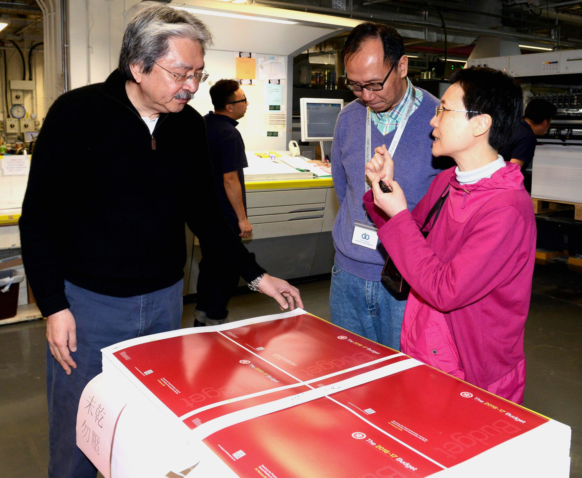 Financial Secretary John Tsang oversees the printing of the 2016-2017 Hong Kong budget papers. Photo: SCMP Pictures