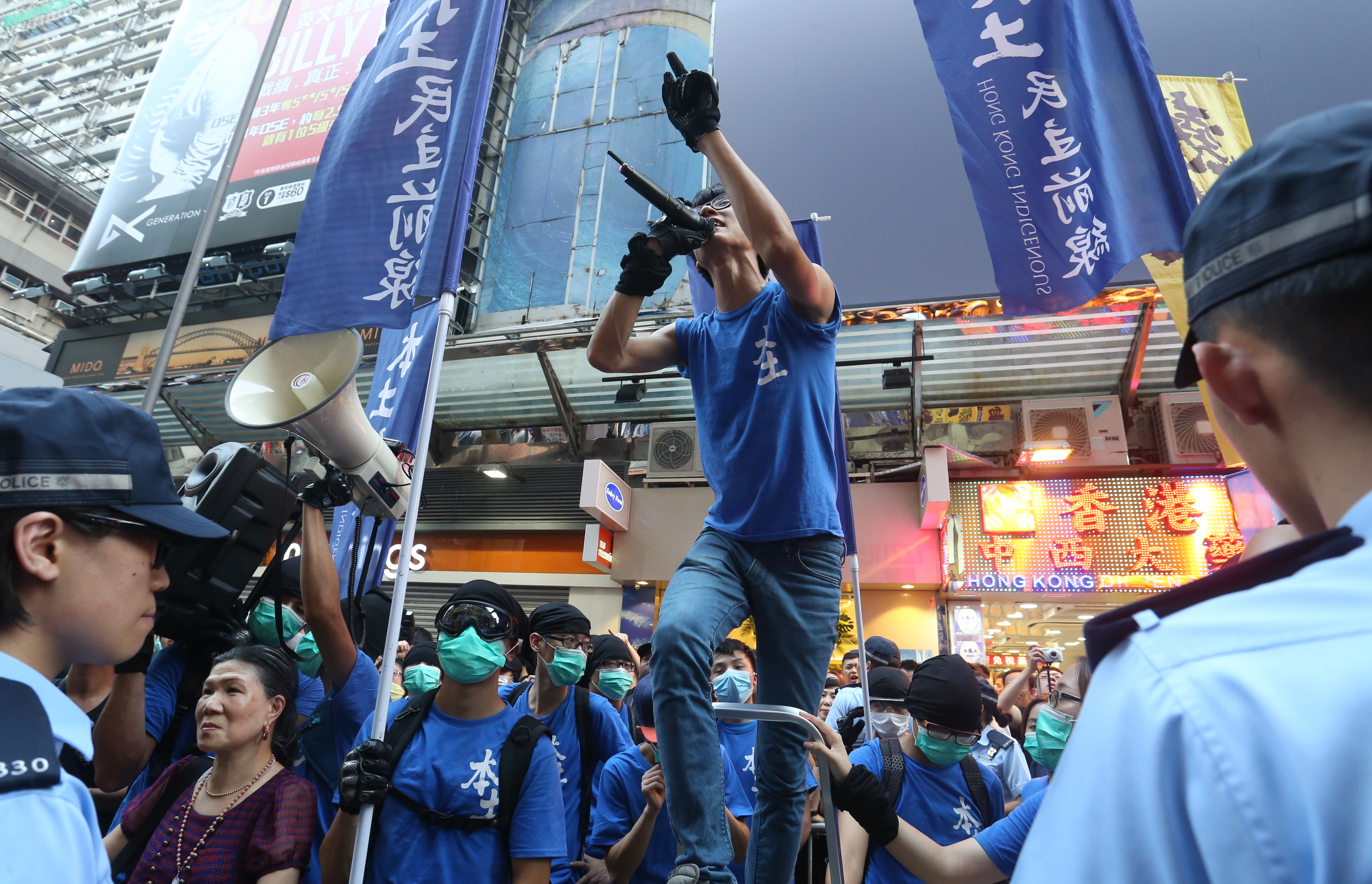 A member of localist group Hong Kong Indigenous speaks at a rally in Mong Kok. What exactly is localism? What are localist groups’ goals and interests and how are they different from those of the pro-establishment camp’s? Photo: Dickson Lee