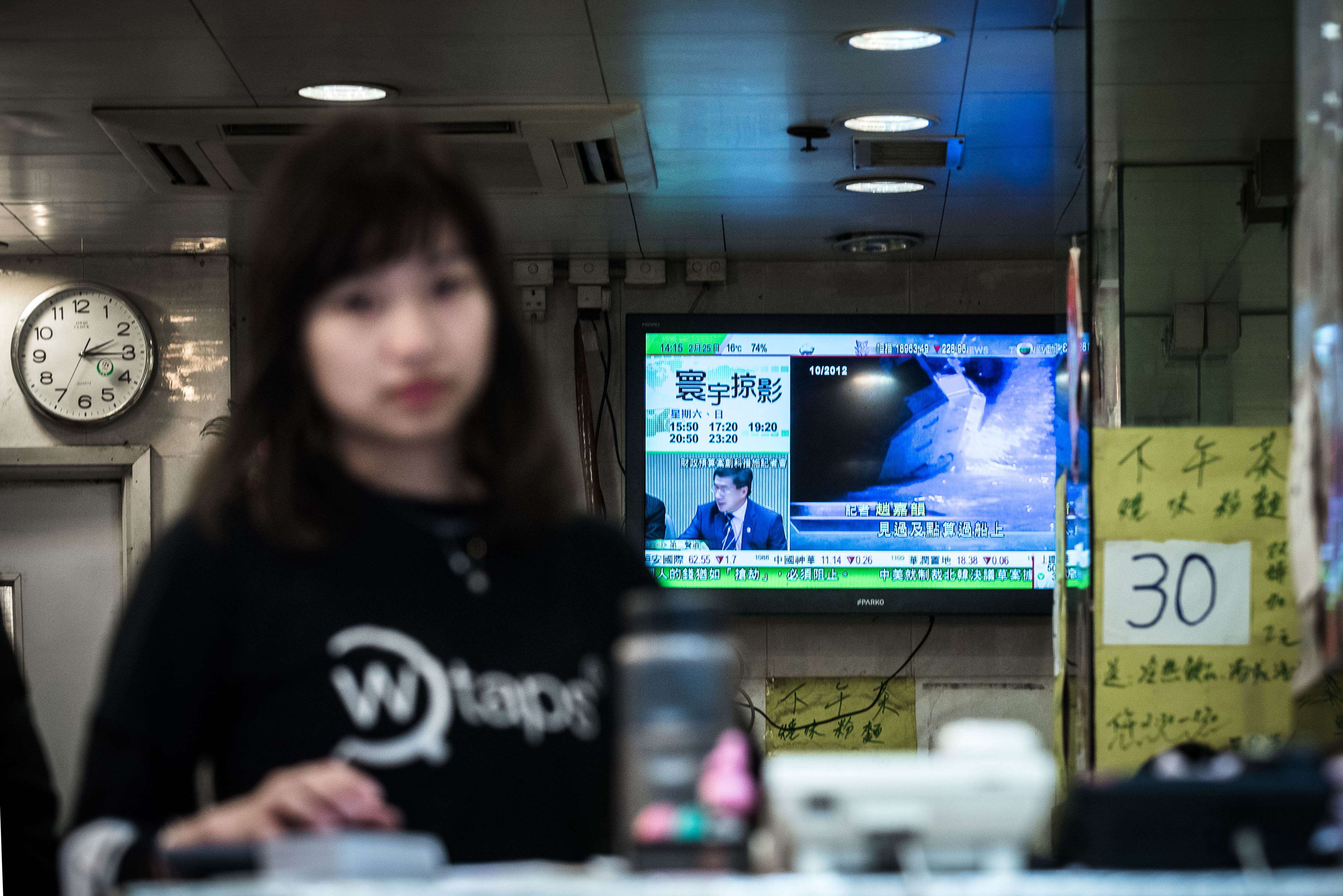 A TVB broadcast plays at a restaurant in Hong Kong. The station’s recent subtitling of Putonghua news in the mainland’s simplified characters has become another storm in Hong Kong’s language wars. Photo: AFP