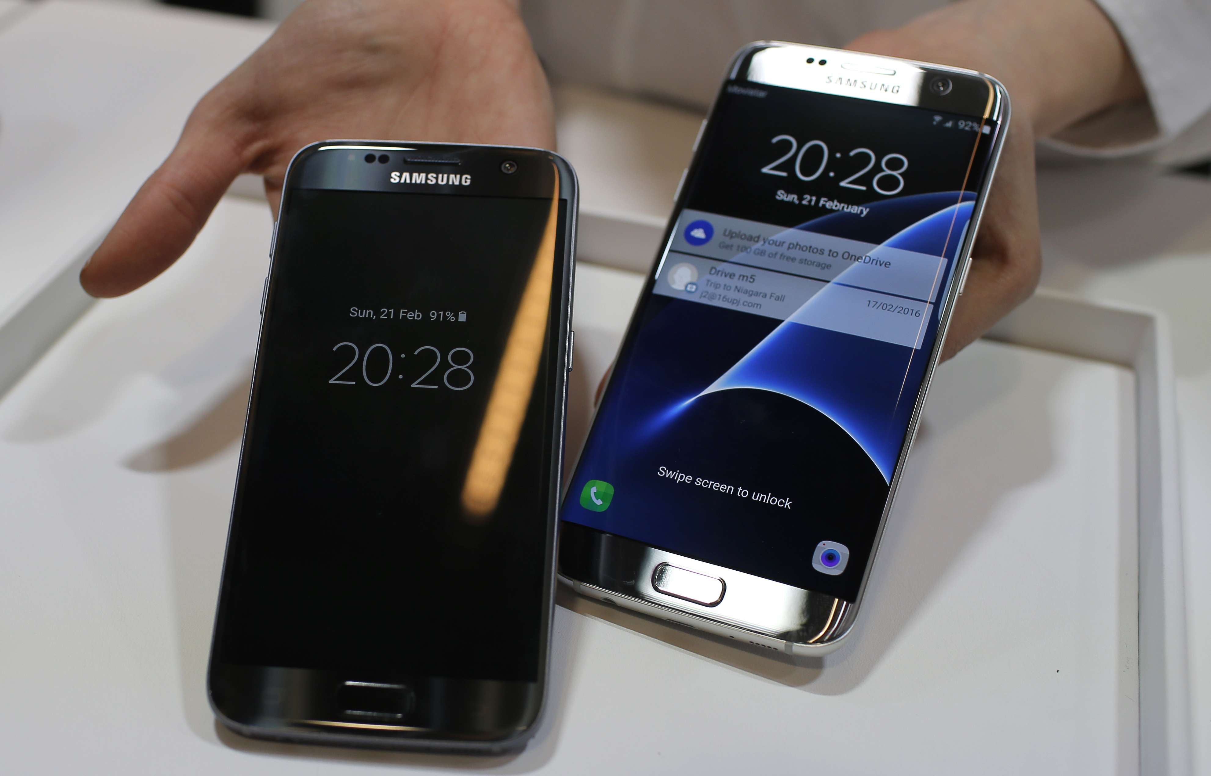 The Samsung Galaxy S7 (left) and S7 Edge displayed during the Samsung Galaxy Unpacked 2016 event on the eve of the Mobile World Congress wireless show, in Barcelona, Spain. Photo: AP