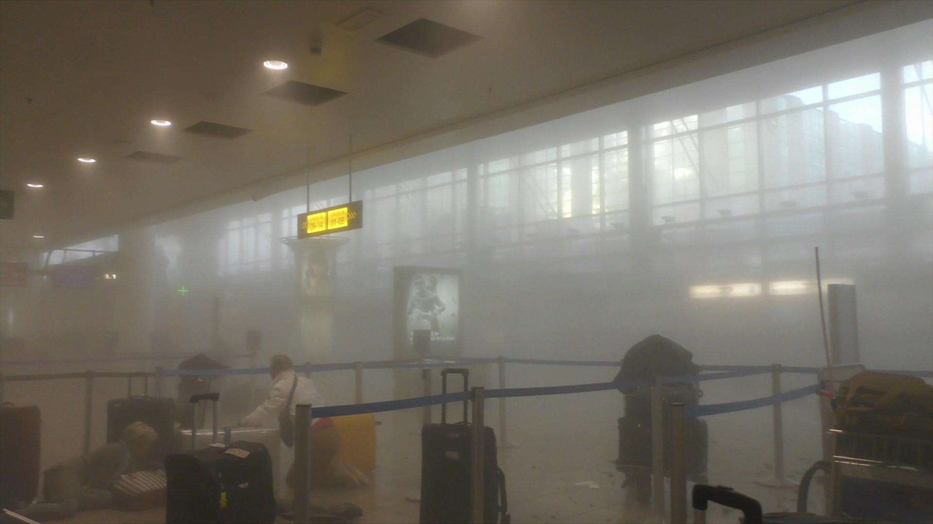 A smoke-filled Brussels Airport after explosions turned morning travellers into victims March 22 Photo: Ralph Usbeck/AP