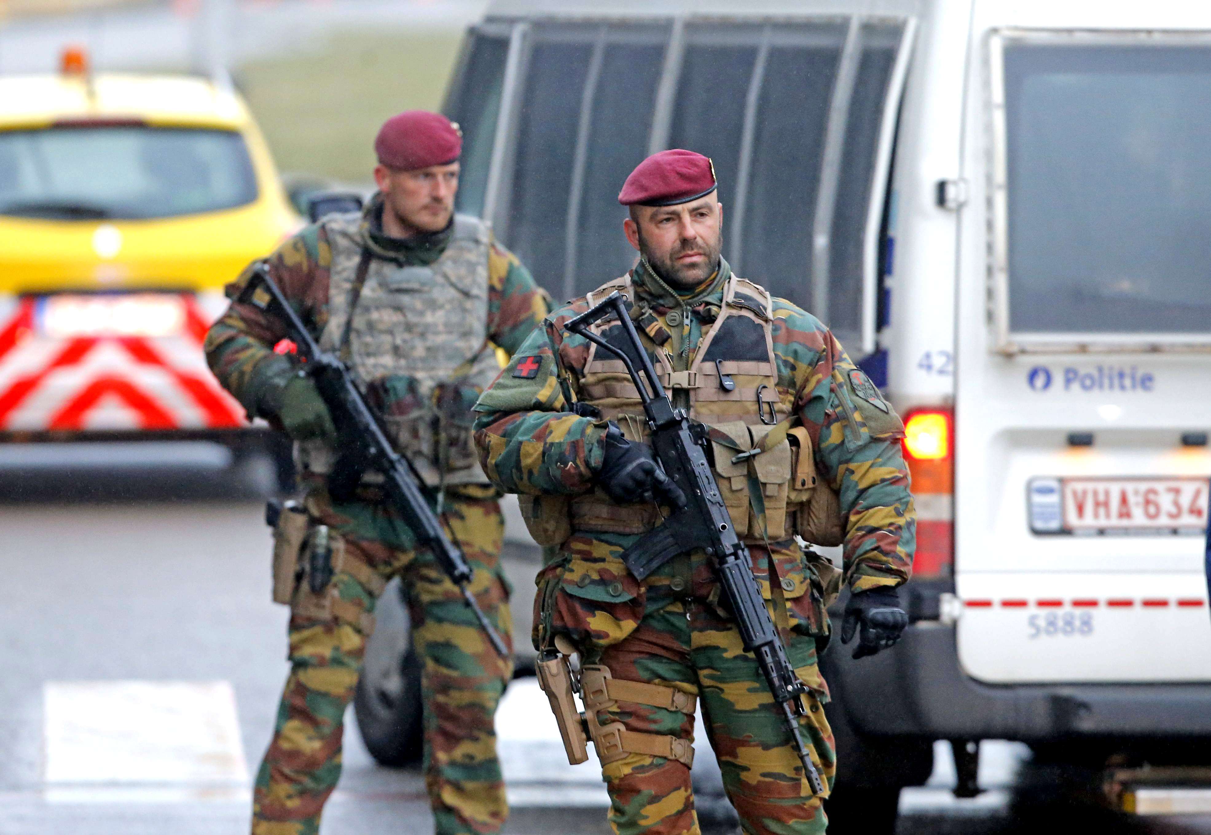 Belgian soldiers check vehicles of airport workers on their arrival at Zaventem airport in Brussels, Belgium. Security services are on high alert following two explosions in the departure hall of Zaventem Airport and later one at Maelbeek Metro station in Brussels yesterday. Photo: EPA