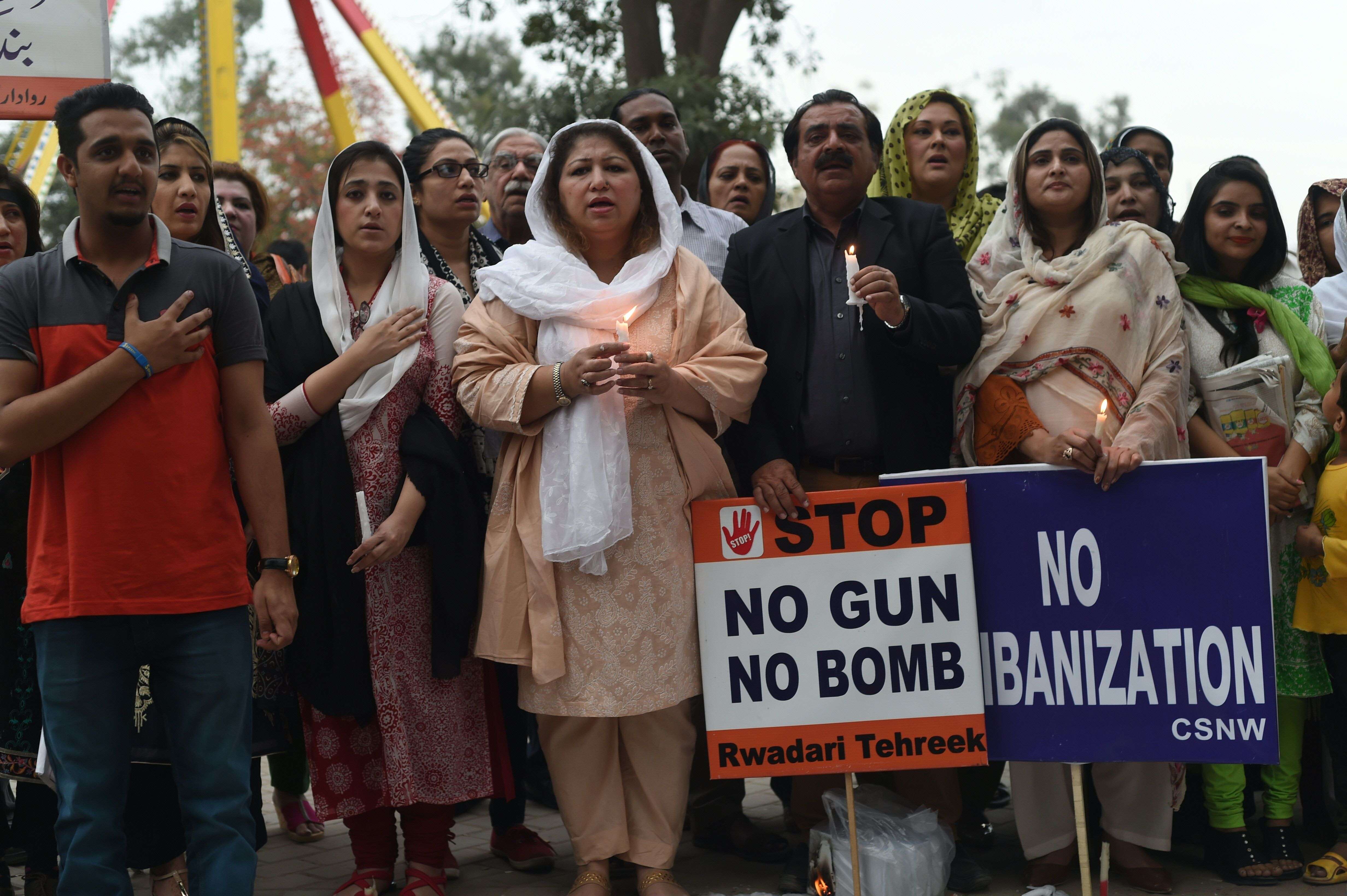 Pakistani civil society members gather at the site of the suicide blast in Lahore on March 28, 2016. Photo: AFP