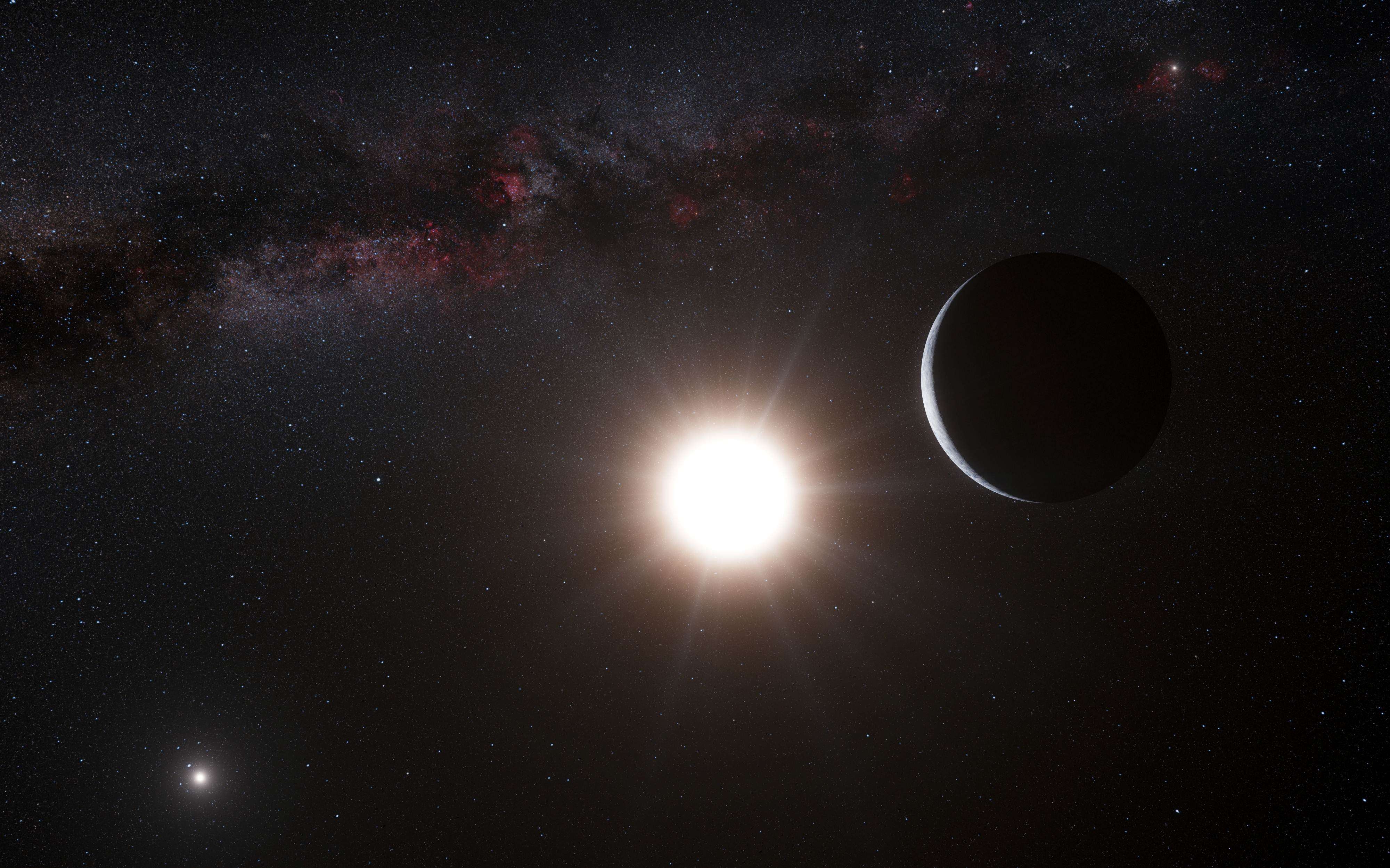 An artist impression of a planet orbiting the star Alpha Centauri B, a member of the triple star system is the closest to Earth. Photo: AFP