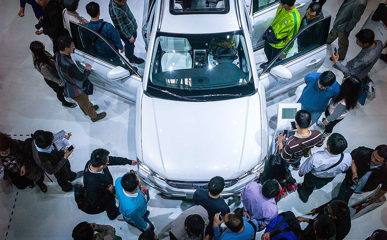 People gather at the Haval stand at the Beijing Auto Show. Photo: AFP