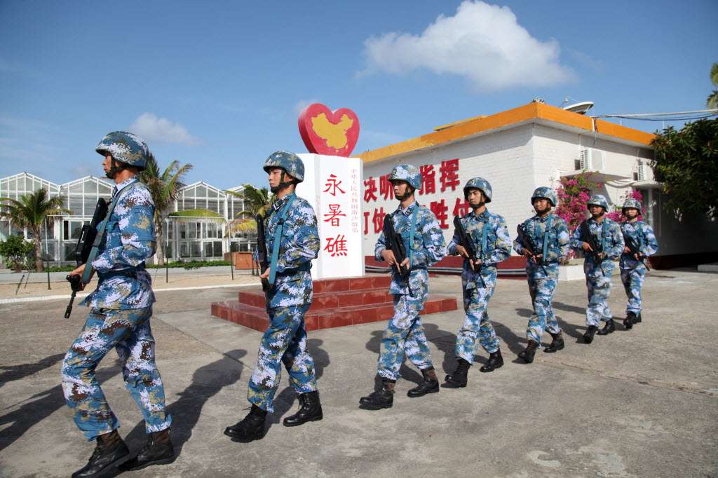 China's People's Liberation Army personnel at Fiery Cross Reef in the Spratly Islands. Photo: Reuters