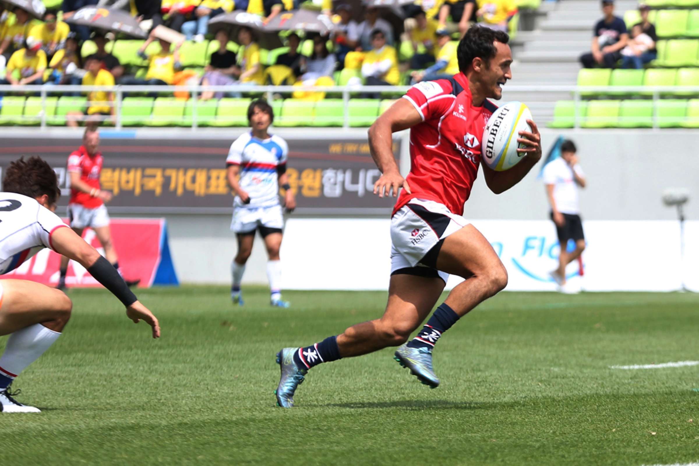 Hong Kong's Ben Rimene collects his chip and chase to score the game-winner against South Korea. Photo: Kenji Demura/RJP