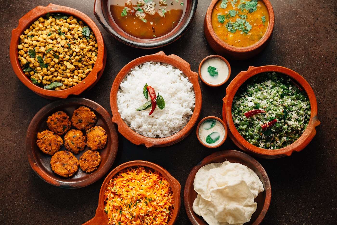 Learn to cook authentic south Indian food at local hostess Durga’s home in Chennai, through Traveling Spoon. It’s just one of many food-focused opportunities available in India.