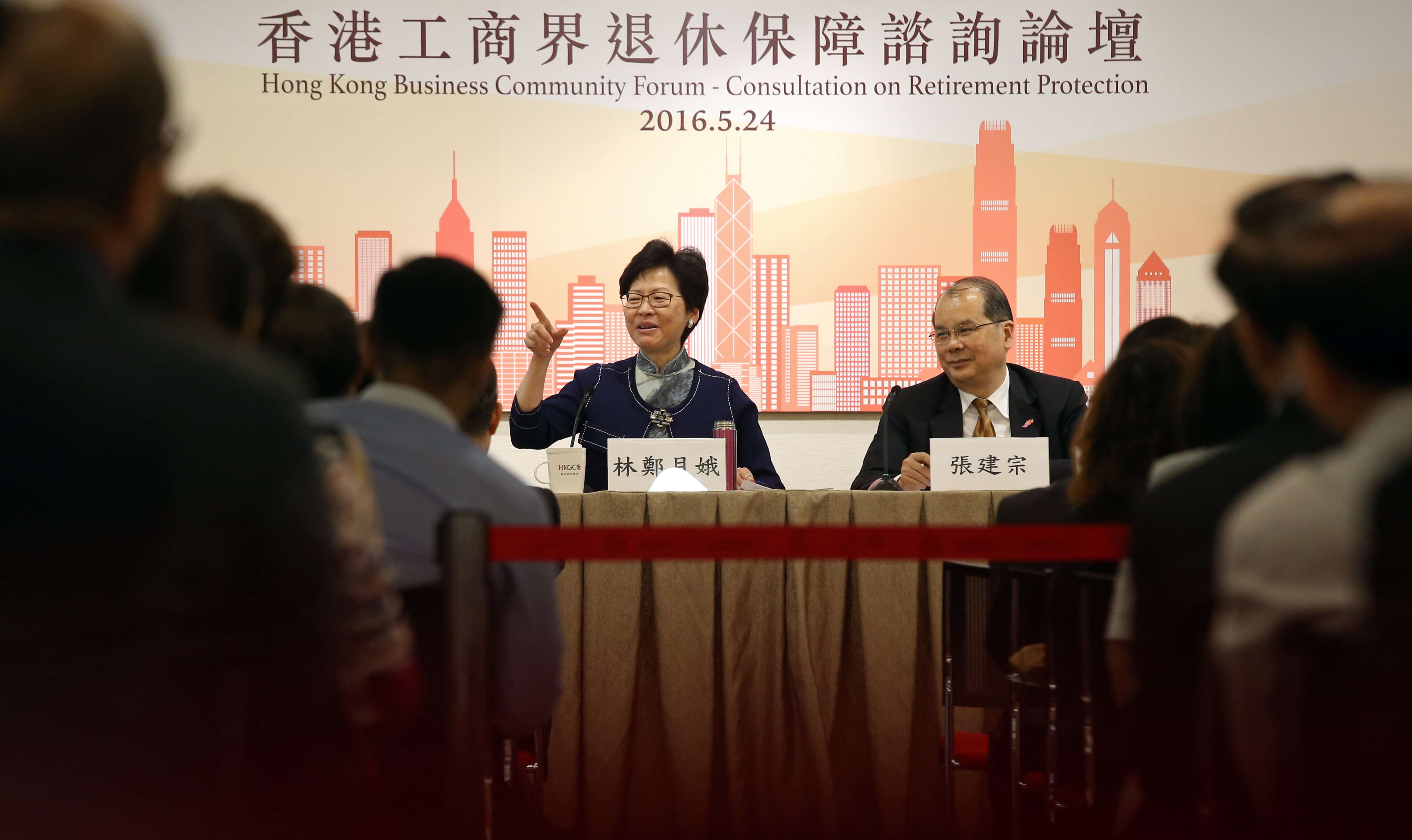 Chief Secretary Carrie Lam and labour minister Matthew Cheung at the forum on retirement protection. Photo: K. Y. Cheng