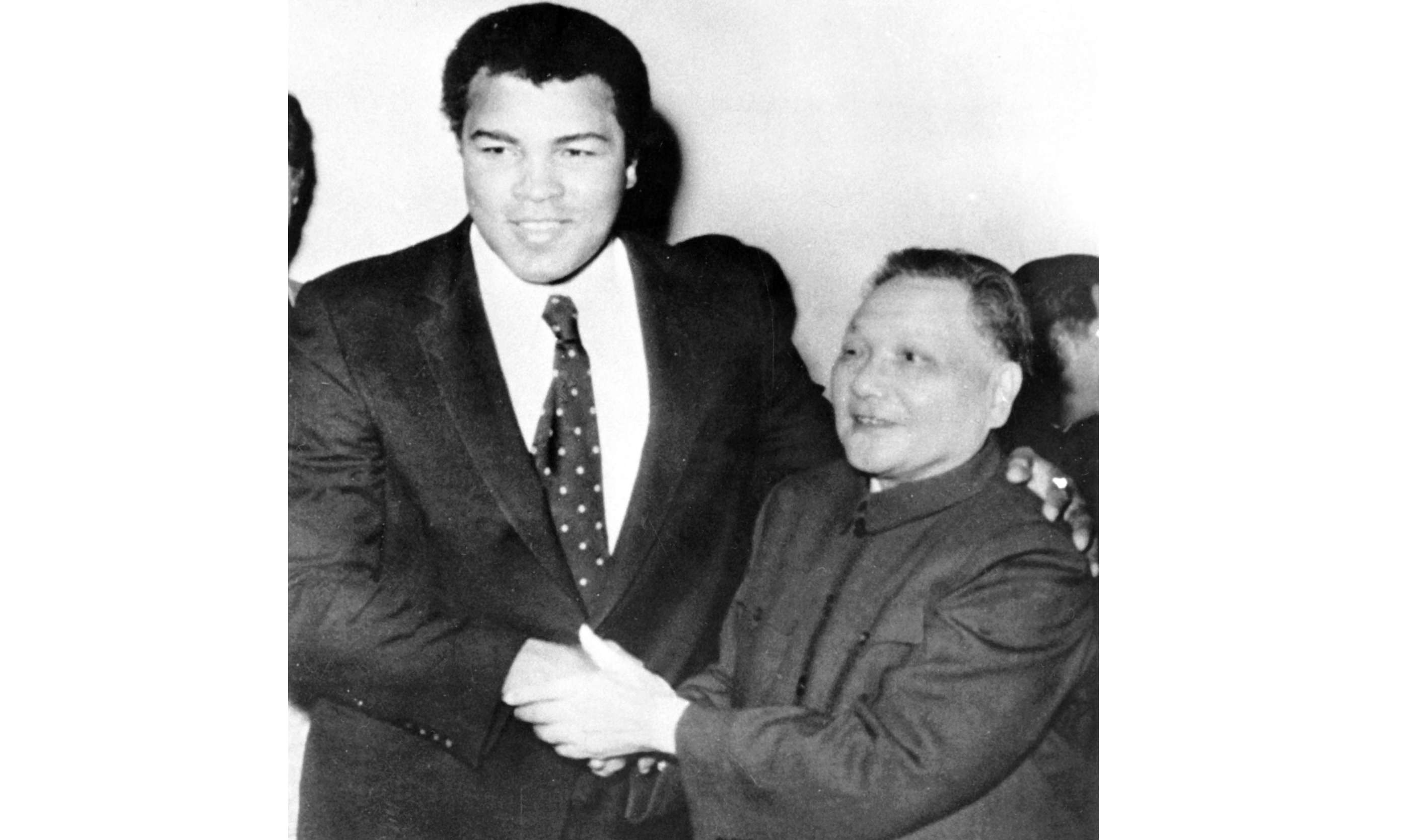 Deng Xiaoping and retired world champion Muhammad Ali shake hands in Beijing in 1979. During their meeting Deng invited Ali to return to China to train boxers for the 1984 Olympics. Photo: AP