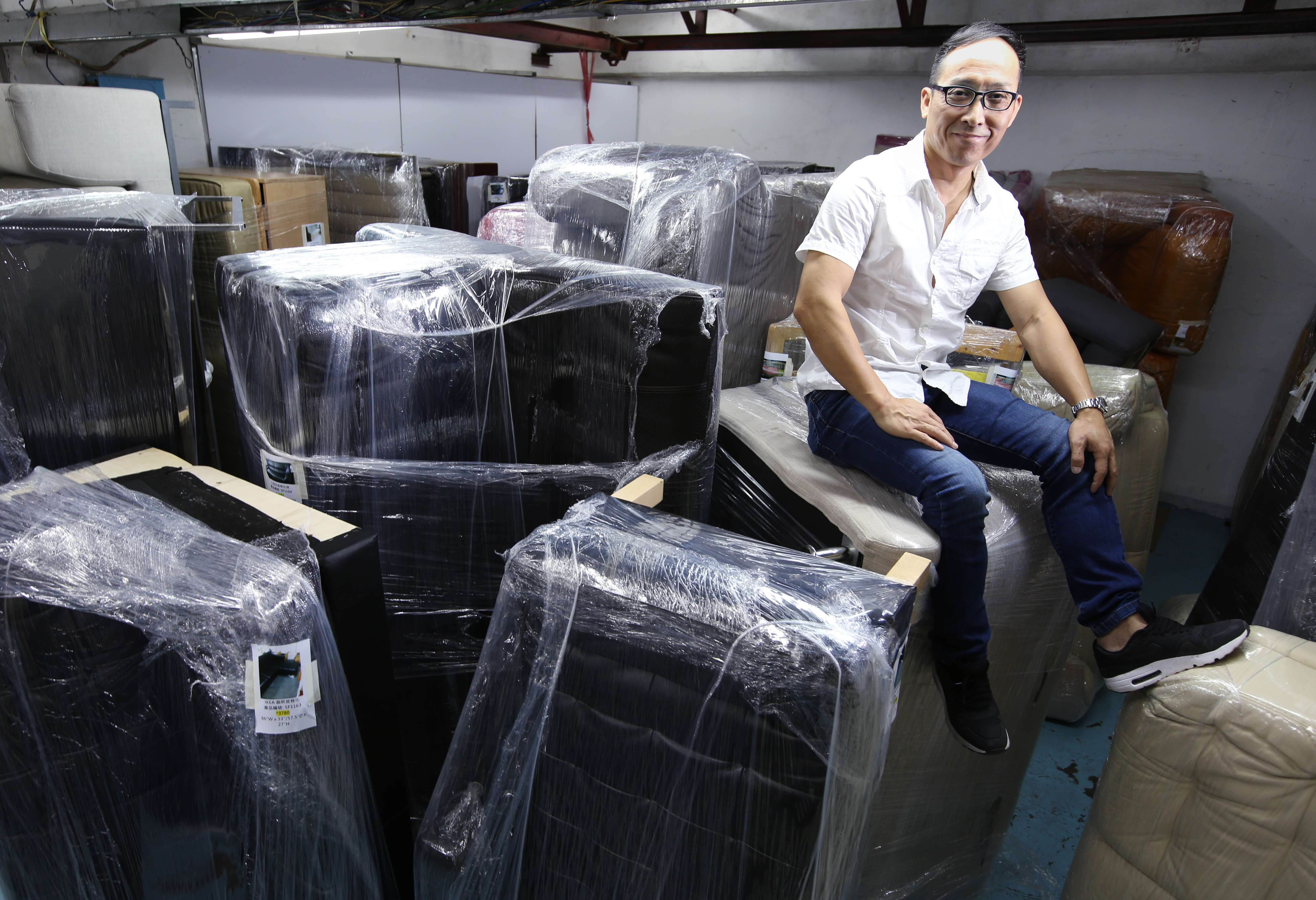 Raymond Ho, founder of Chu Kong Plan, offers his own free labour and helps with collections, deliveries and logistics. Photo: Nora Tam