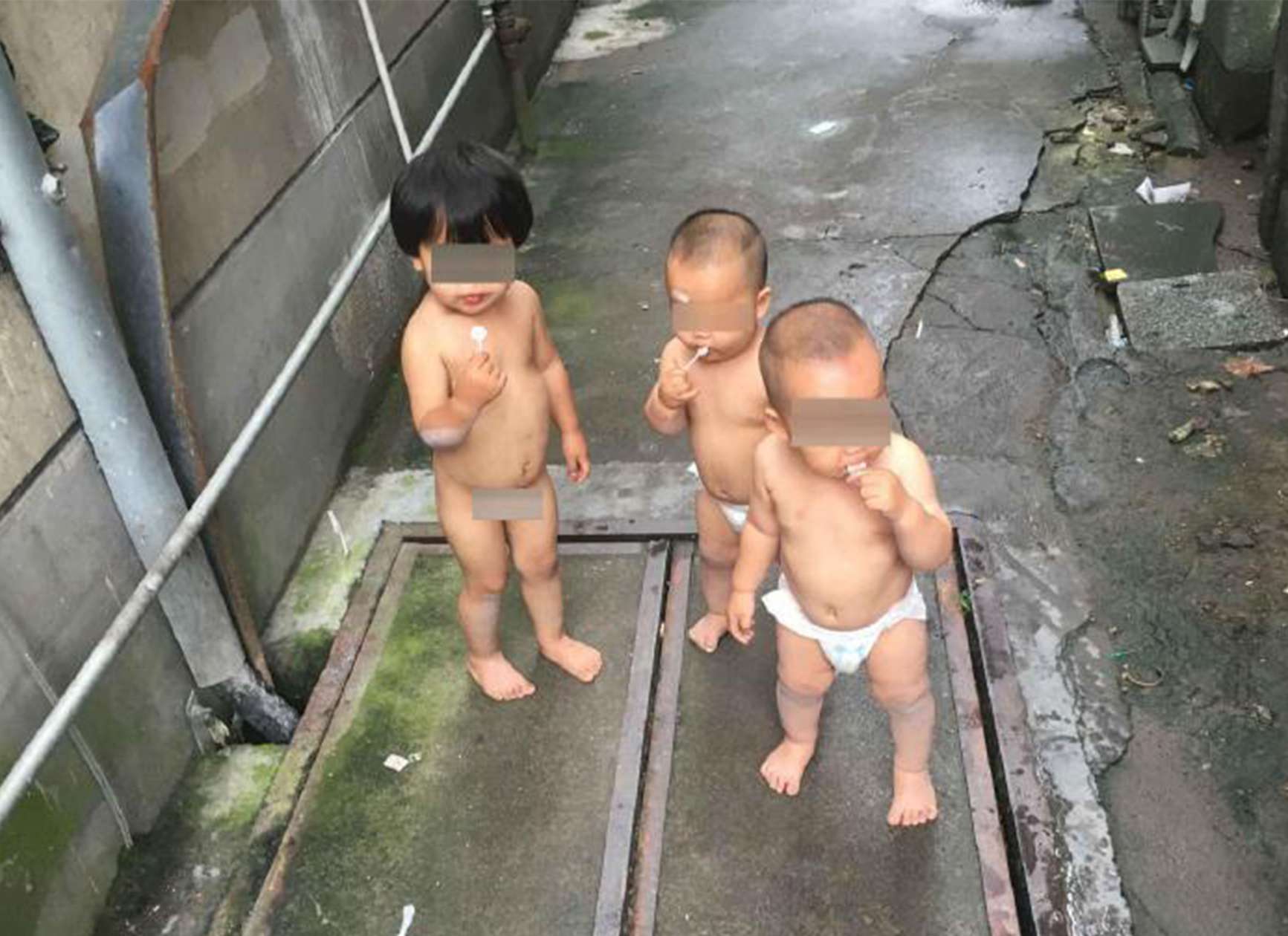 The three children were spotted by police after their ‘great escape’ - only a block from their home. Photo: SCMP Pictures