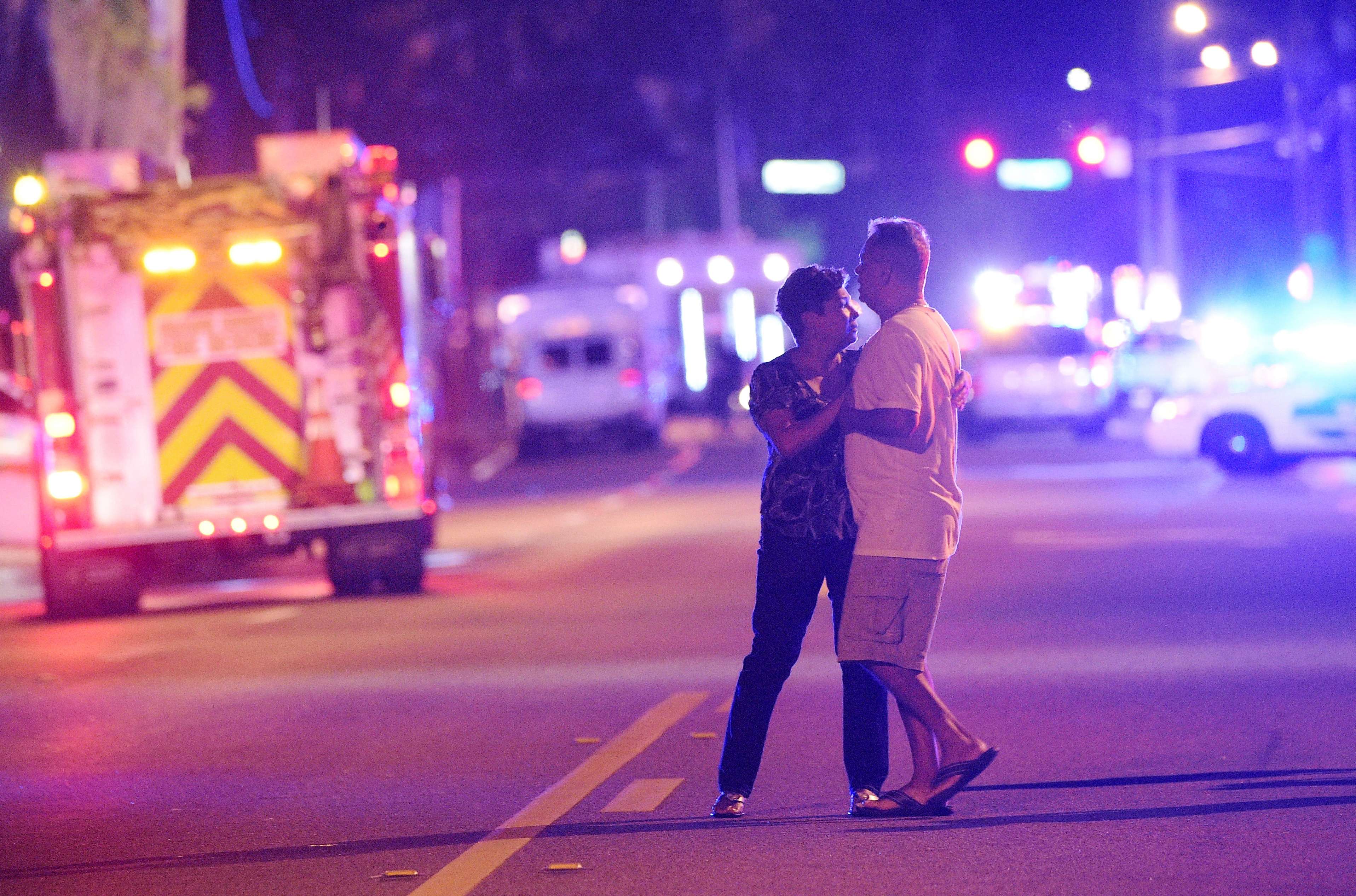 Family members wait for word from the police near the Pulse nightclub in Orlando, Florida, on the night of June 12. Photo: AP