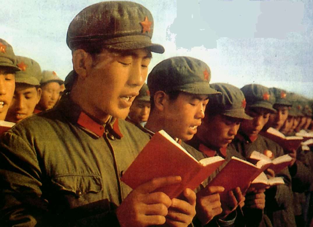Red Guards reading Mao’s “little red book”.