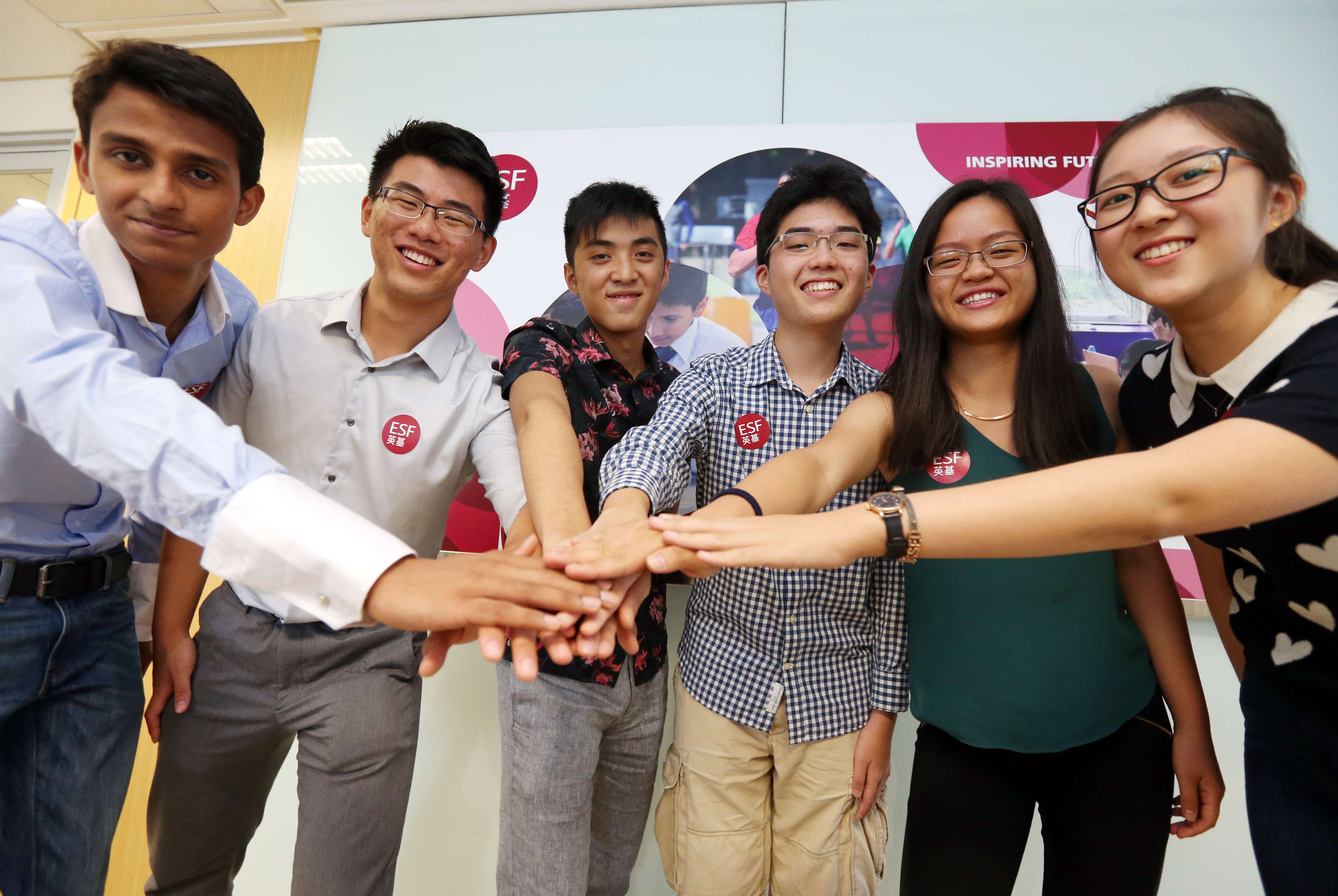 (Left to right) Karthik Ranganatha Subramaniam, Bryan Chan, Garrick Wan, Howard Chae YIi-Hyun, Grace Wang and Yvonne Qian Yi-xuan, from the English Schools Foundation, after they received their IB results. Photo: Dickson Lee