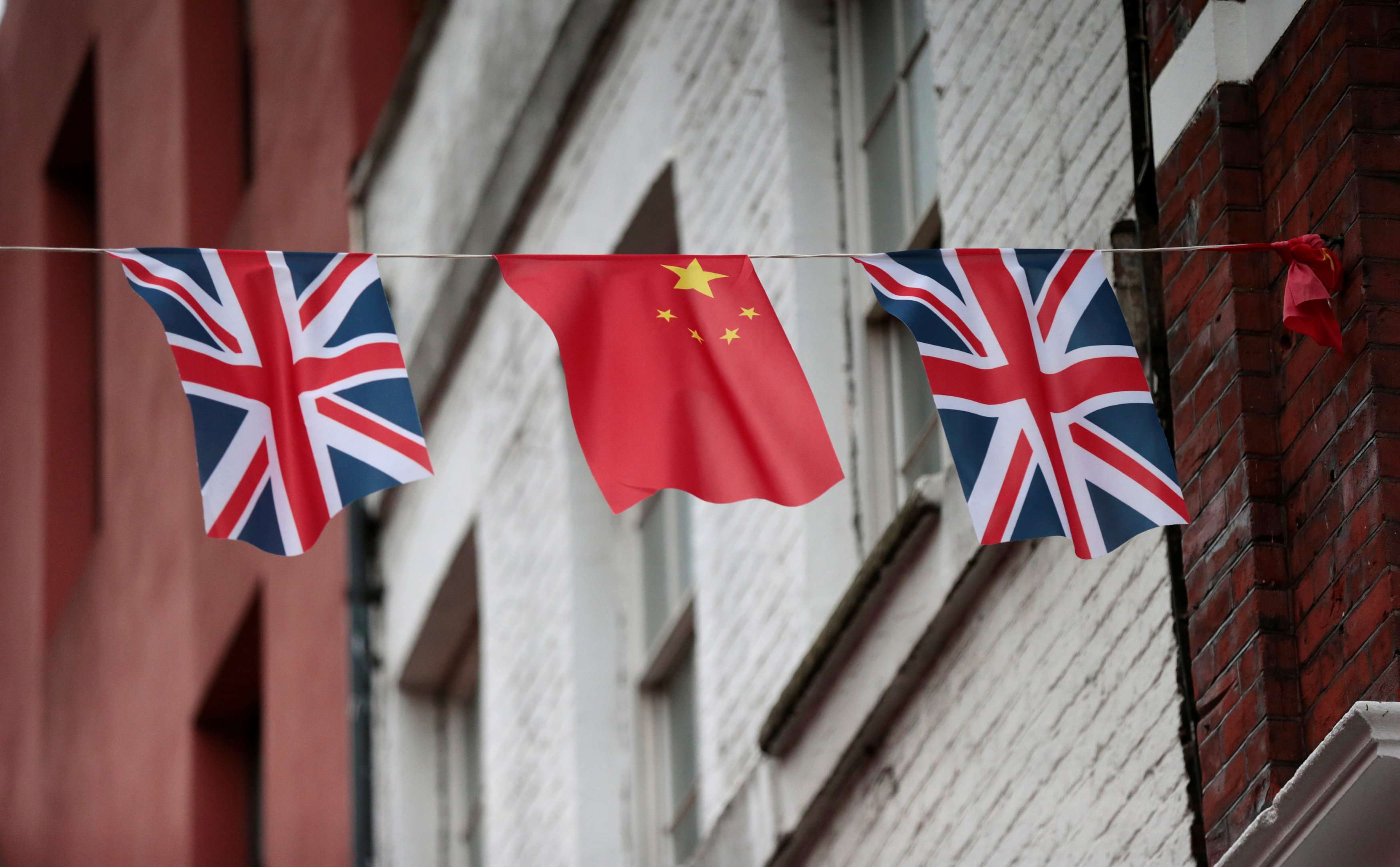 Chinese and British flags fly in London's Chinatown. Photo: Reuters