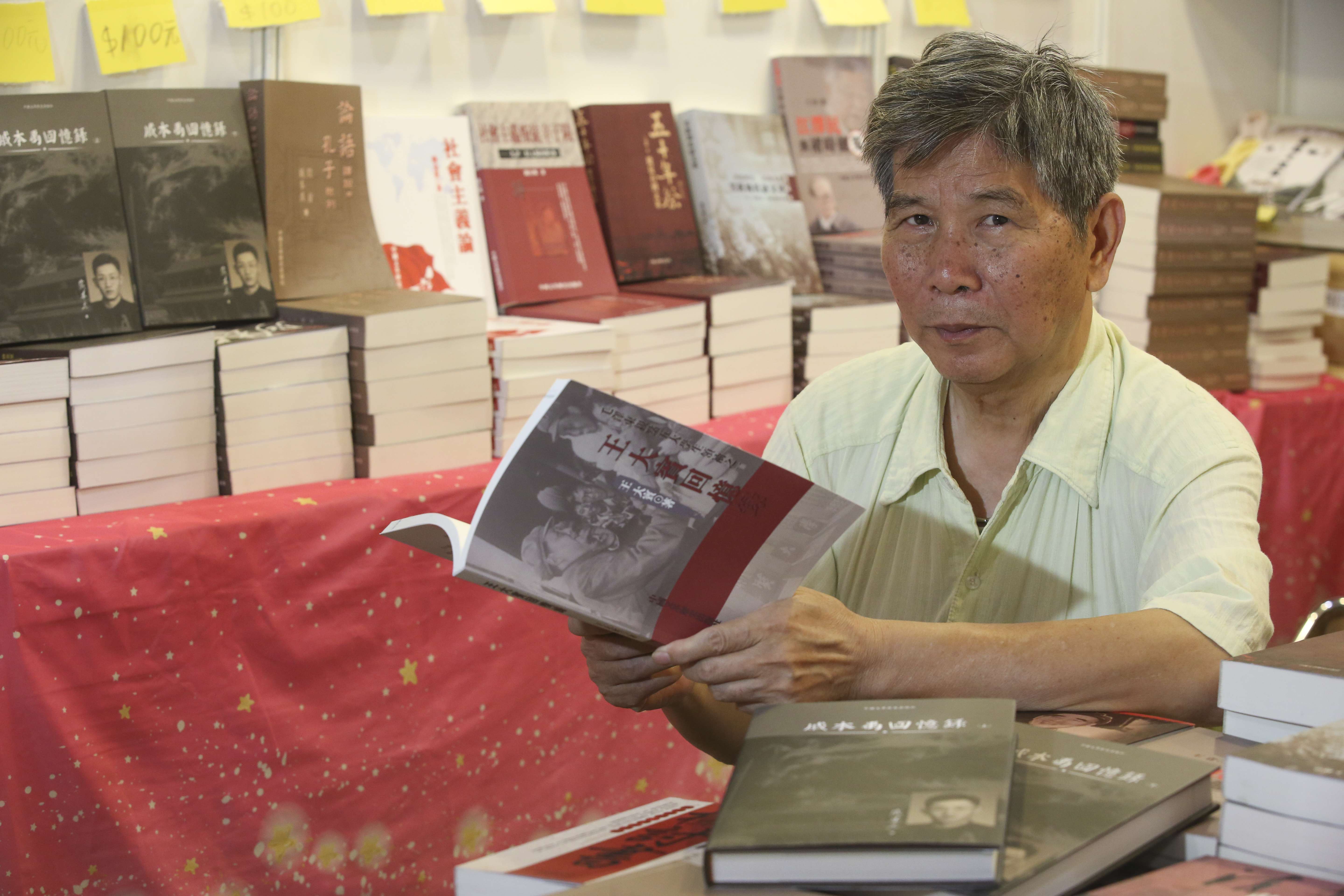 Bookseller Ao Benli, seen at the Hong Kong Book Fair, has spent the past five years running a publishing company devoted to the subject of the Cultural Revolution. Photo: Edward Wong
