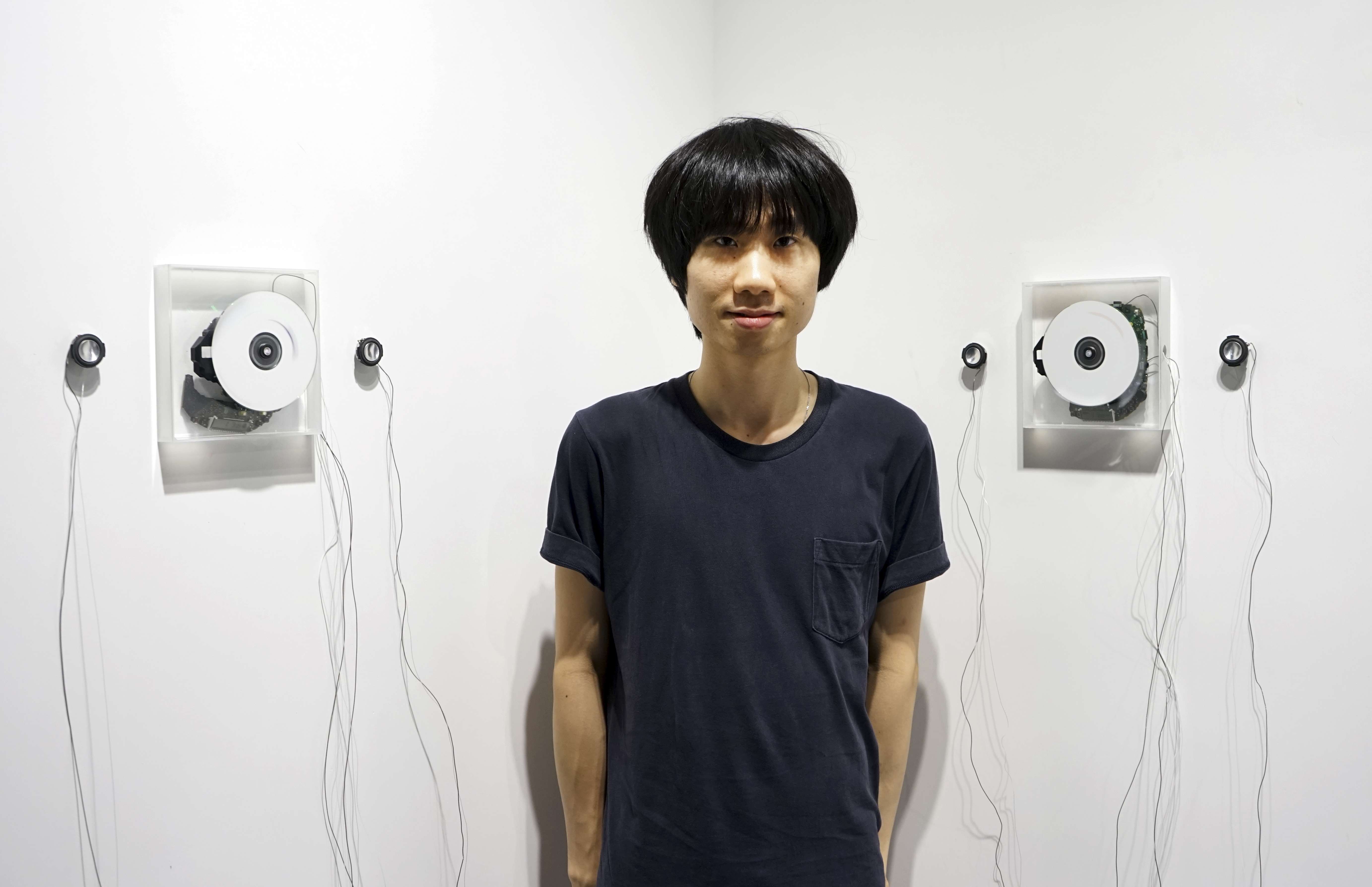 Lee Siu-hin with his installation |·o·||·o·||·o·||·o·||·o·||·o·|, at this year’s First Smash Art Project at Art Experience Gallery.
