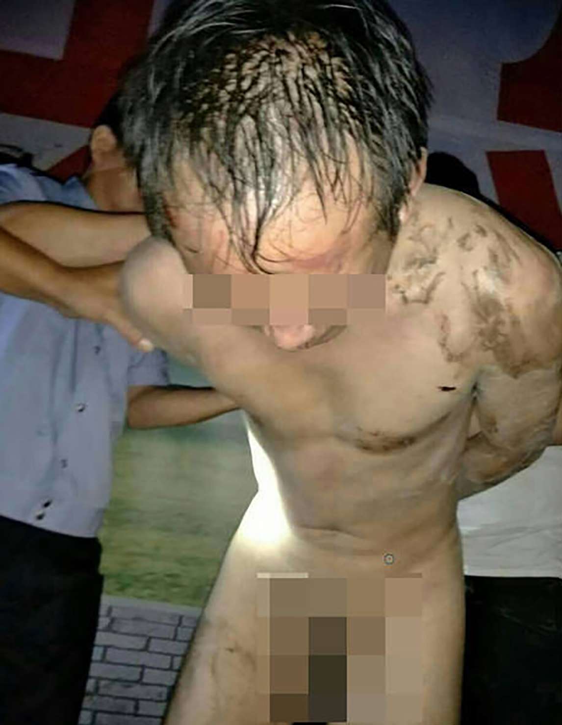The high school teacher was said to have been beaten and stripped naked by the family of one of his female pupils. Photo: SCMP Pictures