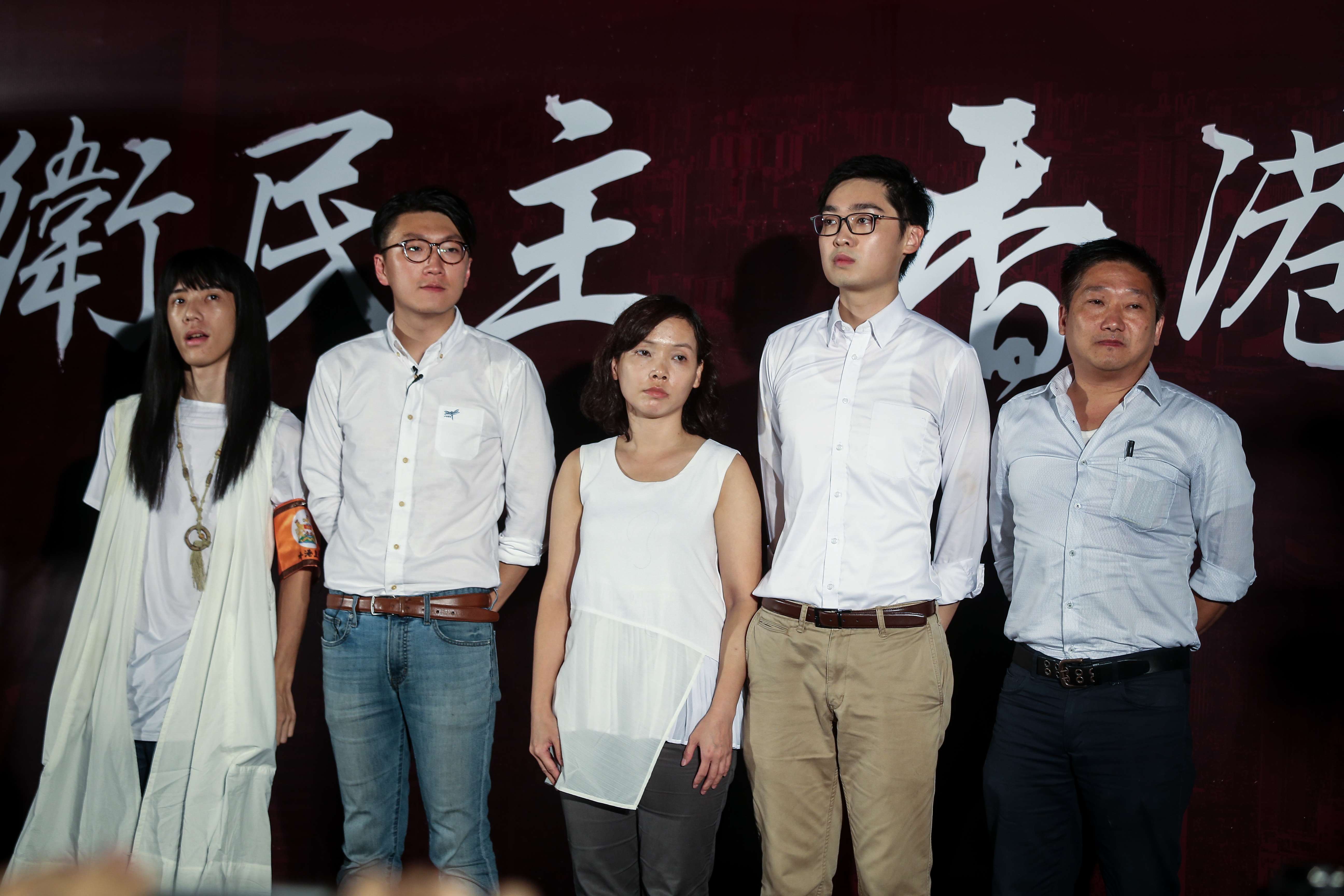 Disqualified Legco election candidates (from left) Nakade Hitsujiko, Edward Leung, Alice Lai, Chan Ho-tin and James Chan make a public announcement at Tamar Park in Admiralty. Photo: K. Y. Cheng