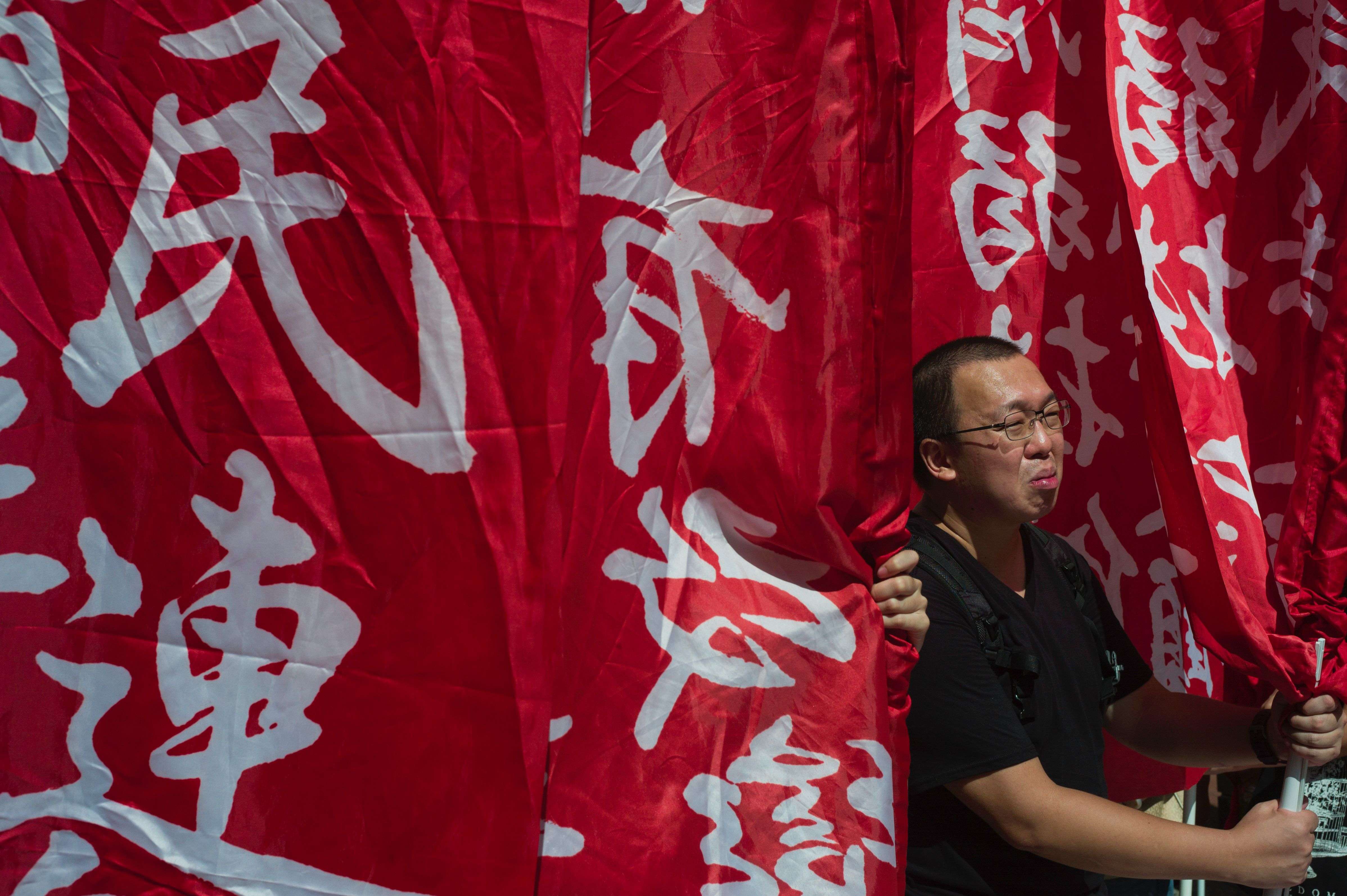 A rally was held last month to protest against the banning of pro-independence candidates in Sunday’s Legislative Council election. Photo: AFP