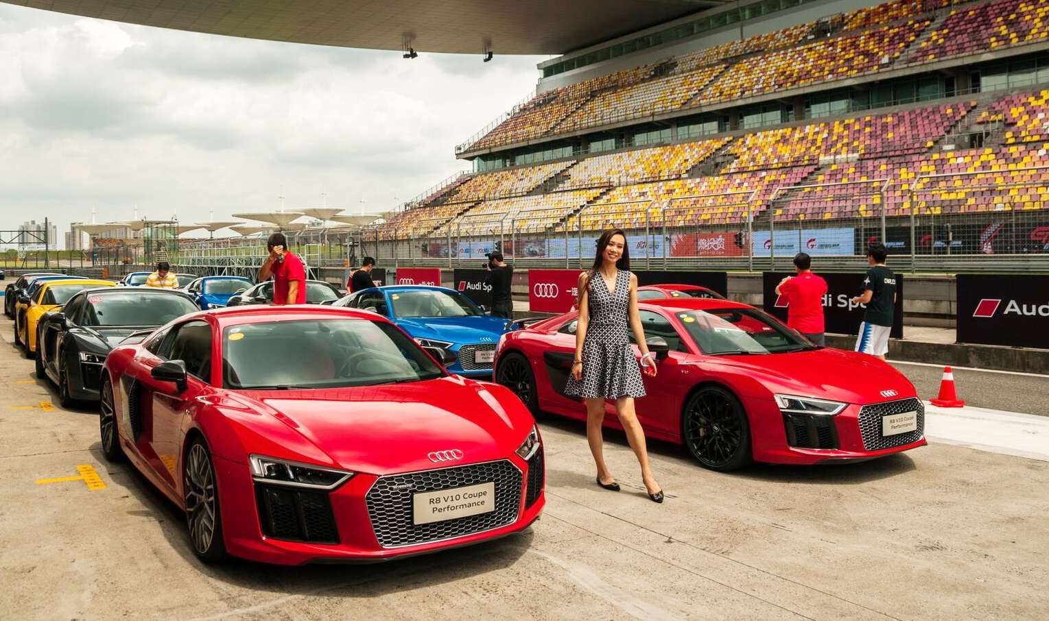 The Audi R8 V10 Coupe Performance cars at the starting line of the Shanghai International Circuit during an Audi customer race day in July. Photo: SCMP Pictures