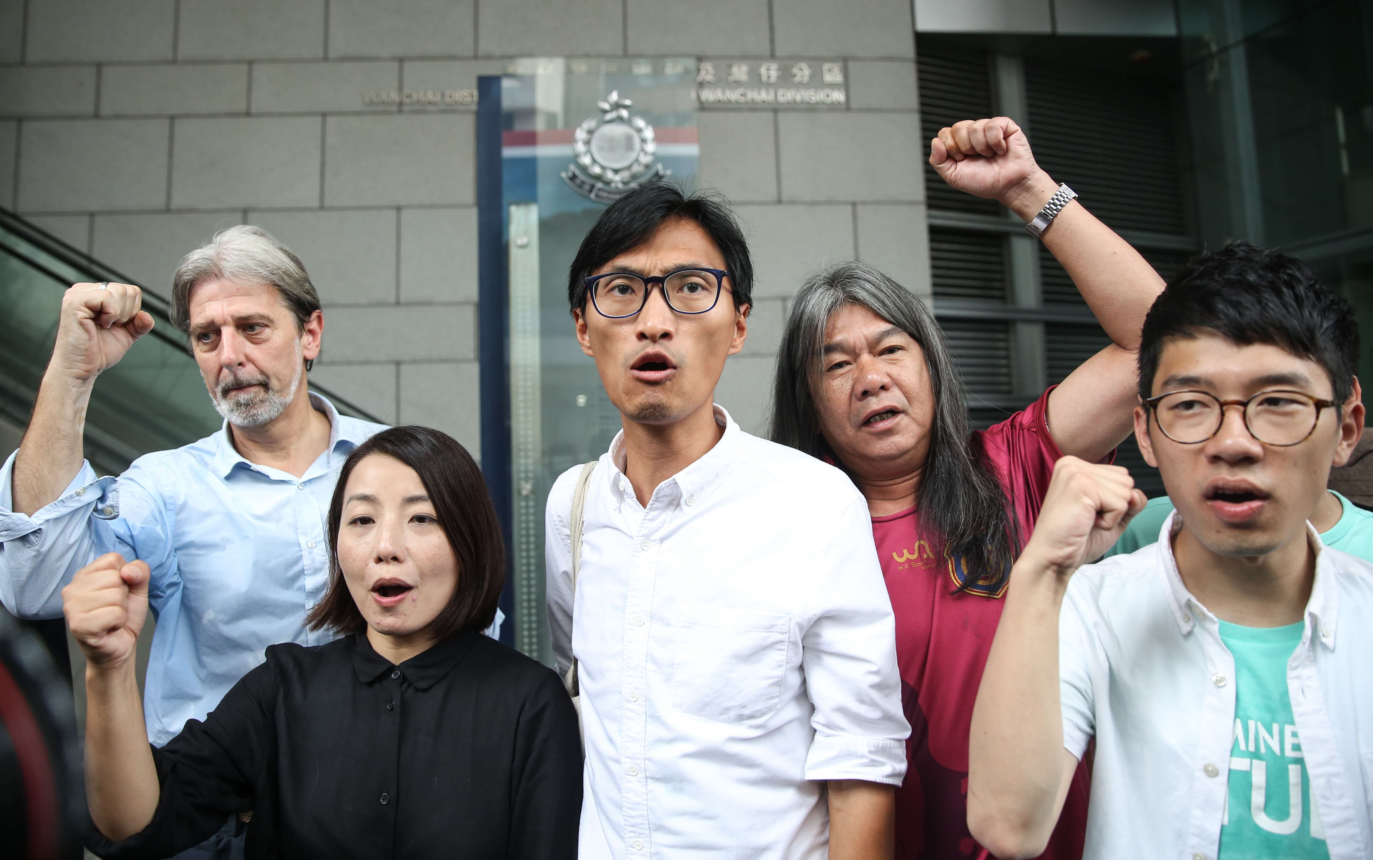Celebrating their victory in the Legislative Council election are (from left), Lau Siu-lai, Eddie Chu, “Long Hair” Leung Kwok-hung and Nathan Law. Photo: Sam Tsang