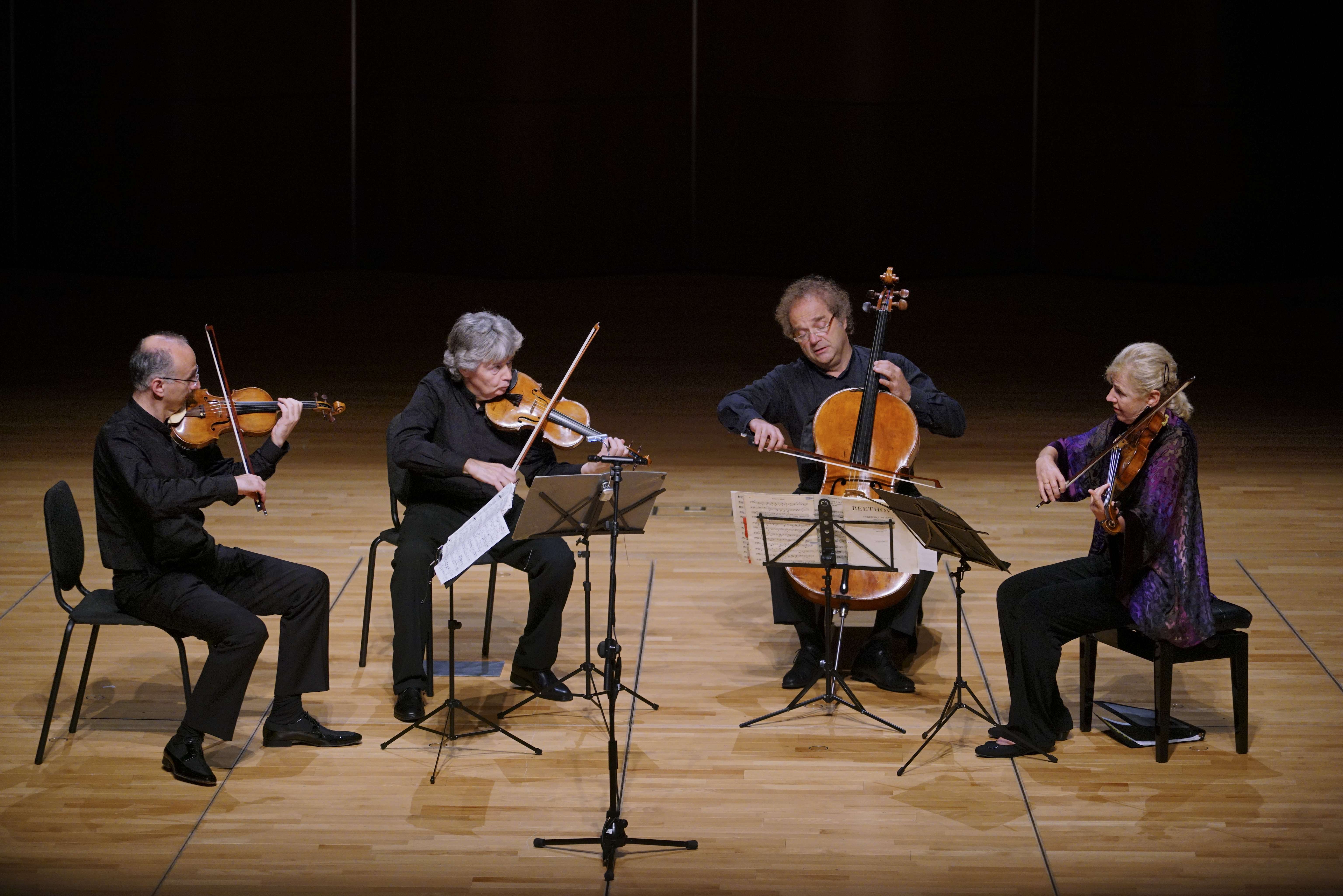 The Takács Quartet (from left) Edward Dusinberre, violin; Károly Schranz, violin; András Fejér, cello; and Geraldine Walther, viola, perform at the Grand Hall, Lee Shau Kee Lecture Centre, The University of Hong Kong.