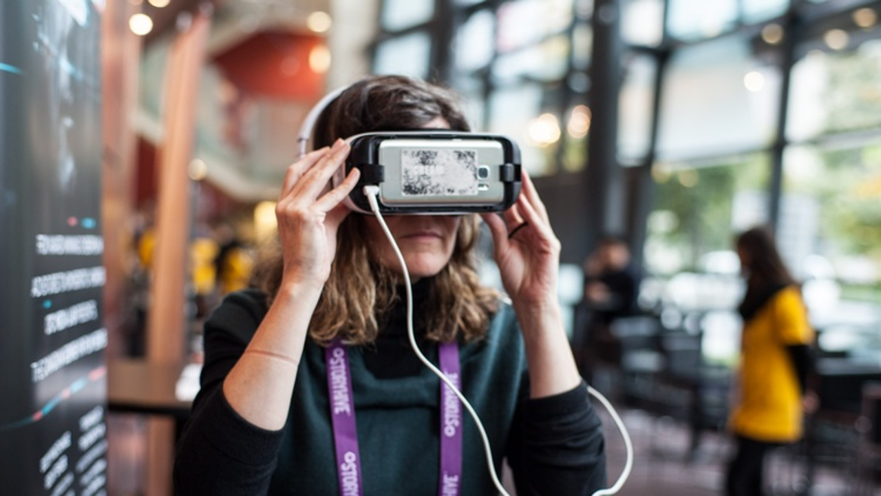 Attendees at the Vancouver International Film Festival’s virtual reality conference explore digital landscapes as industry experts debate whether Hollywood can make money from VR. Photo: Shannon RD Miller