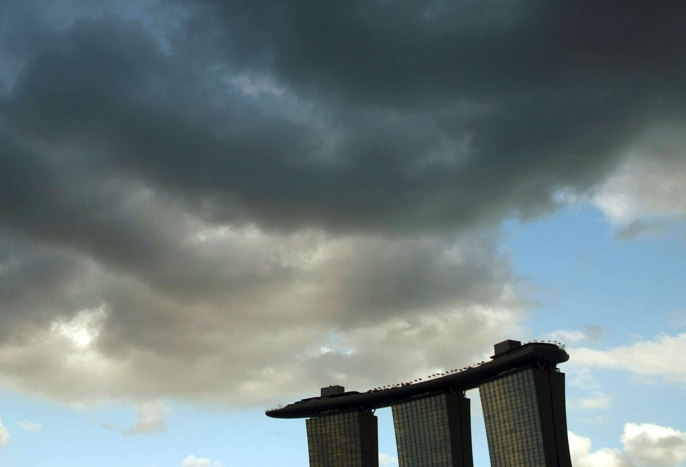 Clouds gather above the Marina Bay Sands resort in Singapore. Photo: Reuters