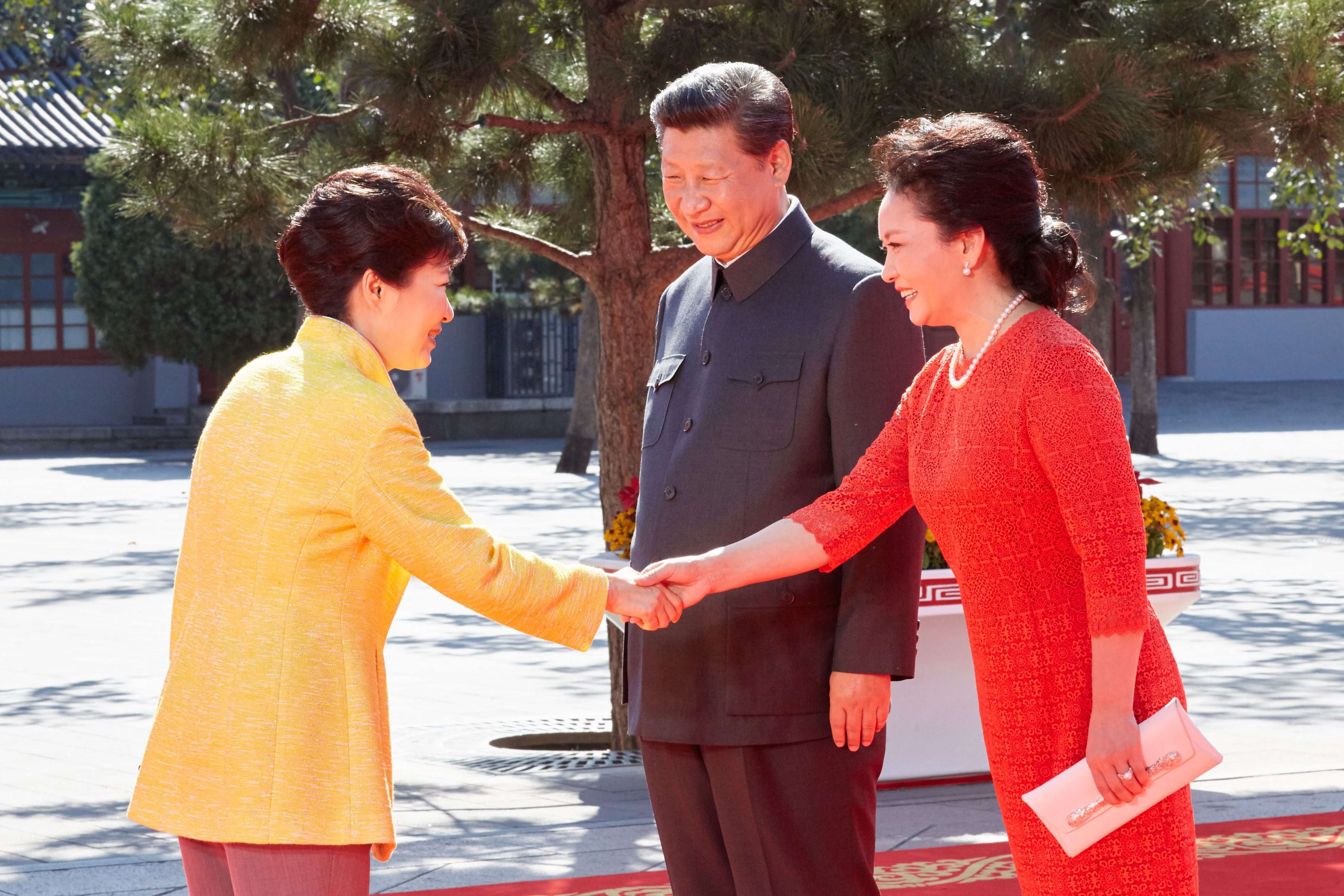 President Xi Jinping and first lady Peng Liyuan welcome South Korean President Park Geun-hye at Tiananmen Square in September last year. Park was in Beijing to attend a military parade to mark the 70th anniversary of the end of the second world war. Photo: EPA