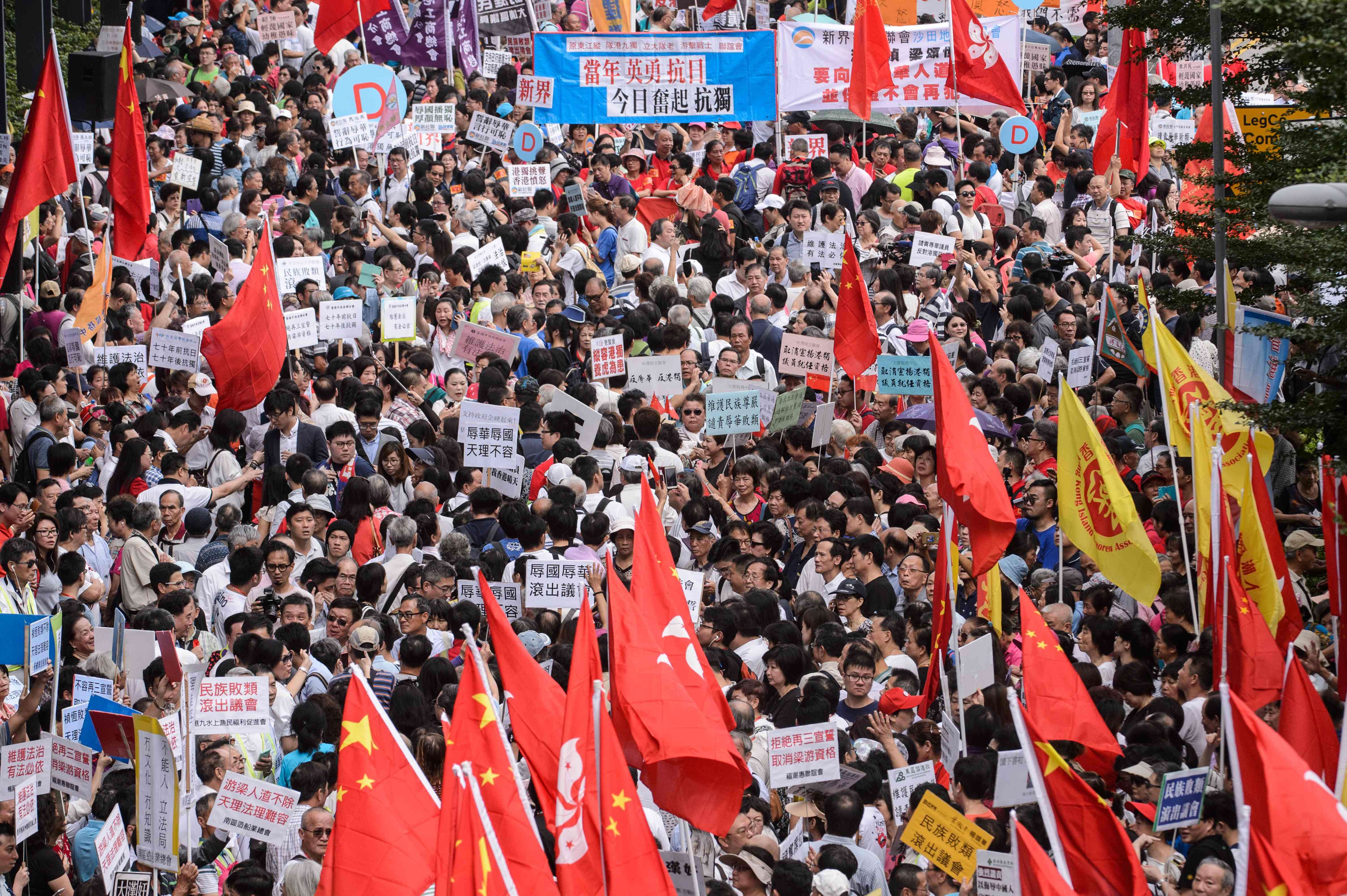 Thousands of pro-Beijing demonstrators outside the Legislative Council protest against localist lawmakers on October 26. Hong Kong is a shambles and the people are polarised and confused. Photo: AFP