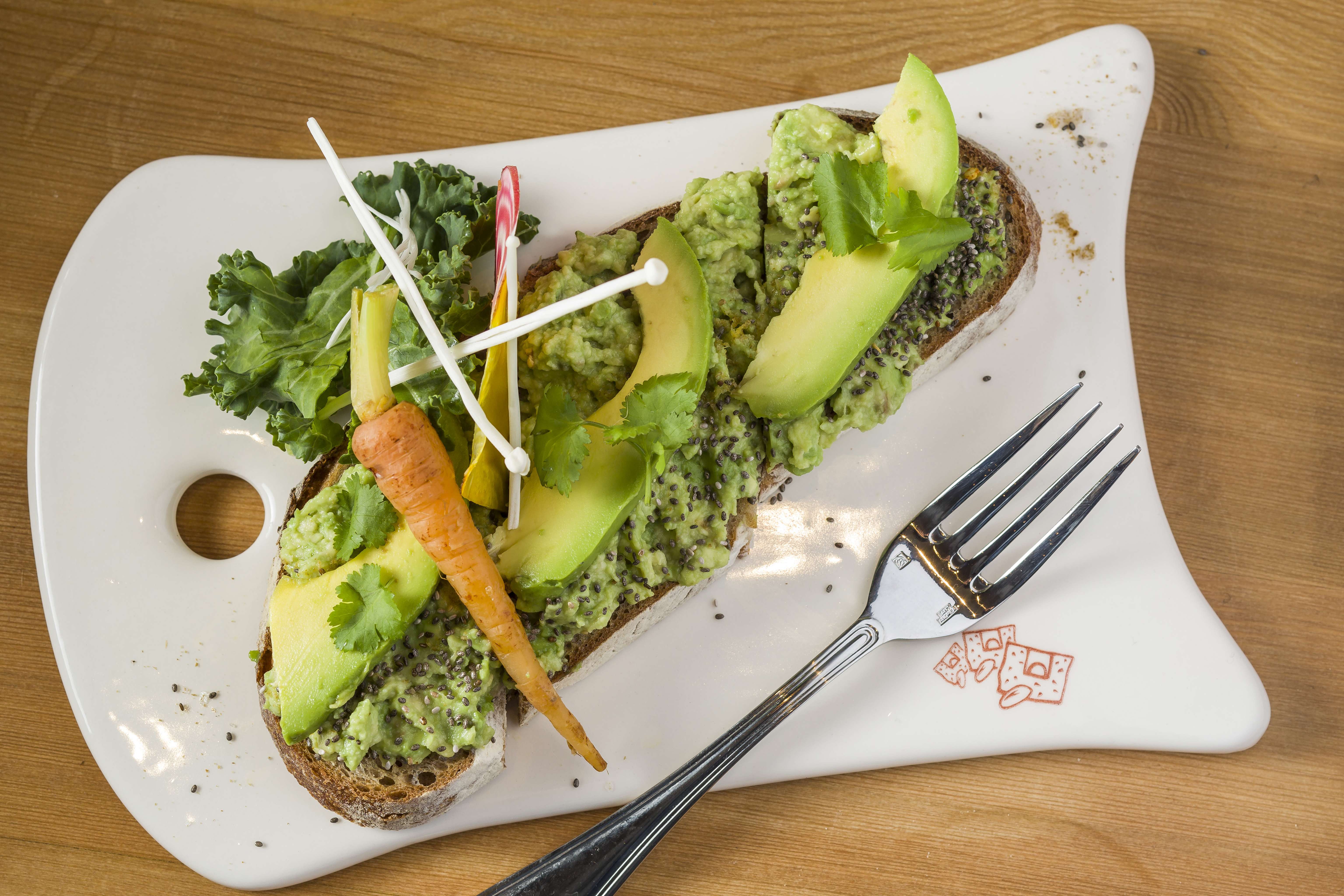 An Australian economist has created a storm by suggesting young people could climb on to the property ladder by saving on luxuries such as avocado on toast. File photo