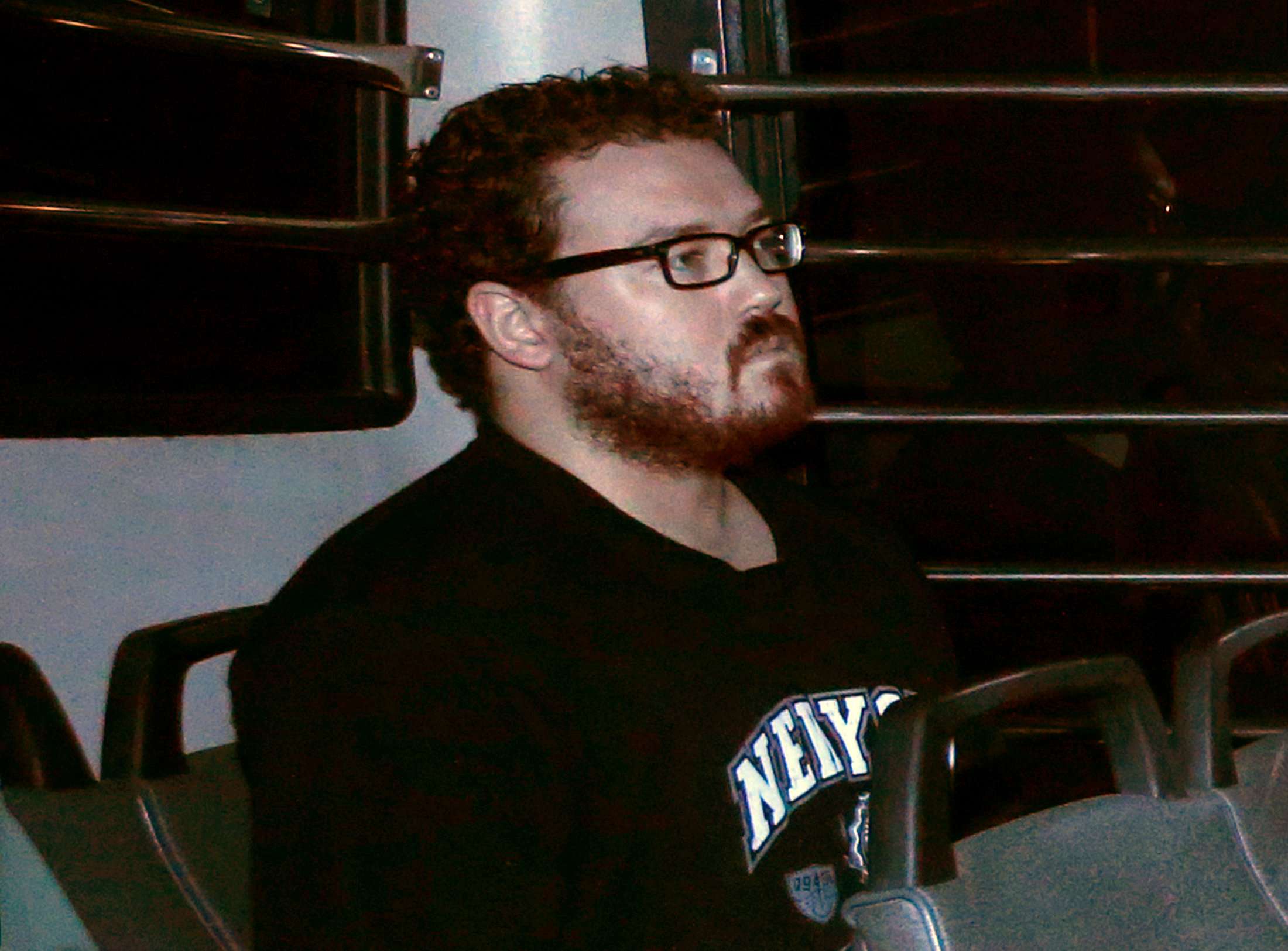 A 2014 photo of Rurik Jutting in a prison bus as he arrived at court. Photo: Reuters