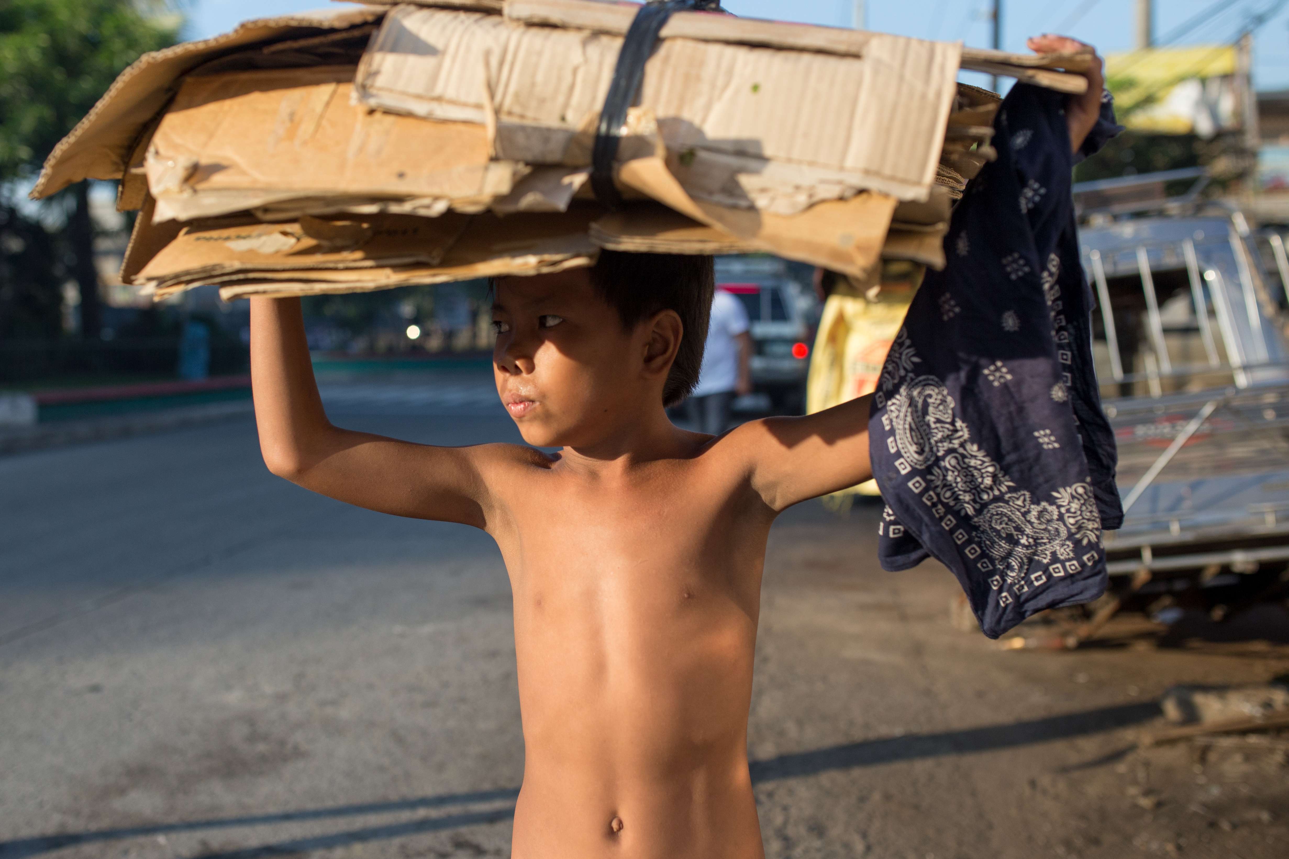 Children in Manila’s poorest neighbourhoods are paying an especially heavy price for the anti-drugs campaign of the Philippine president, which has taken thousands of lives since he came to power. Photographs by Paul Ratje