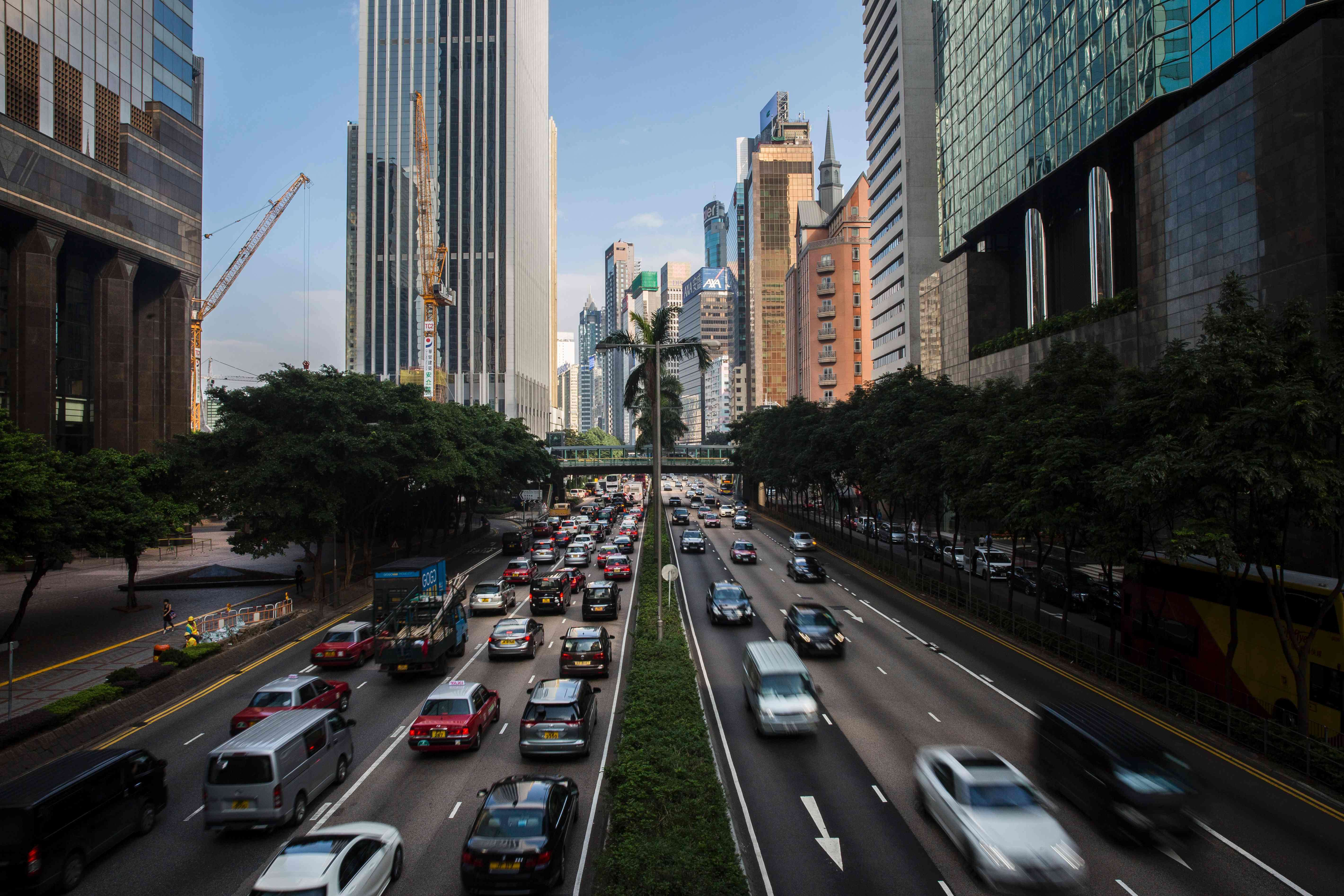 Traffic on Gloucester Road in Wan Chai. In a good start, the Lands Department has launched a public information portal called GeoInfo Map, which contains over 180 kinds of spatial data provided by 26 government departments. Photo: AFP