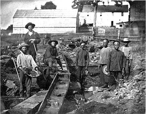 Western and Chinese miners during the California Gold Rush at Auburn Ravine, in 1852.