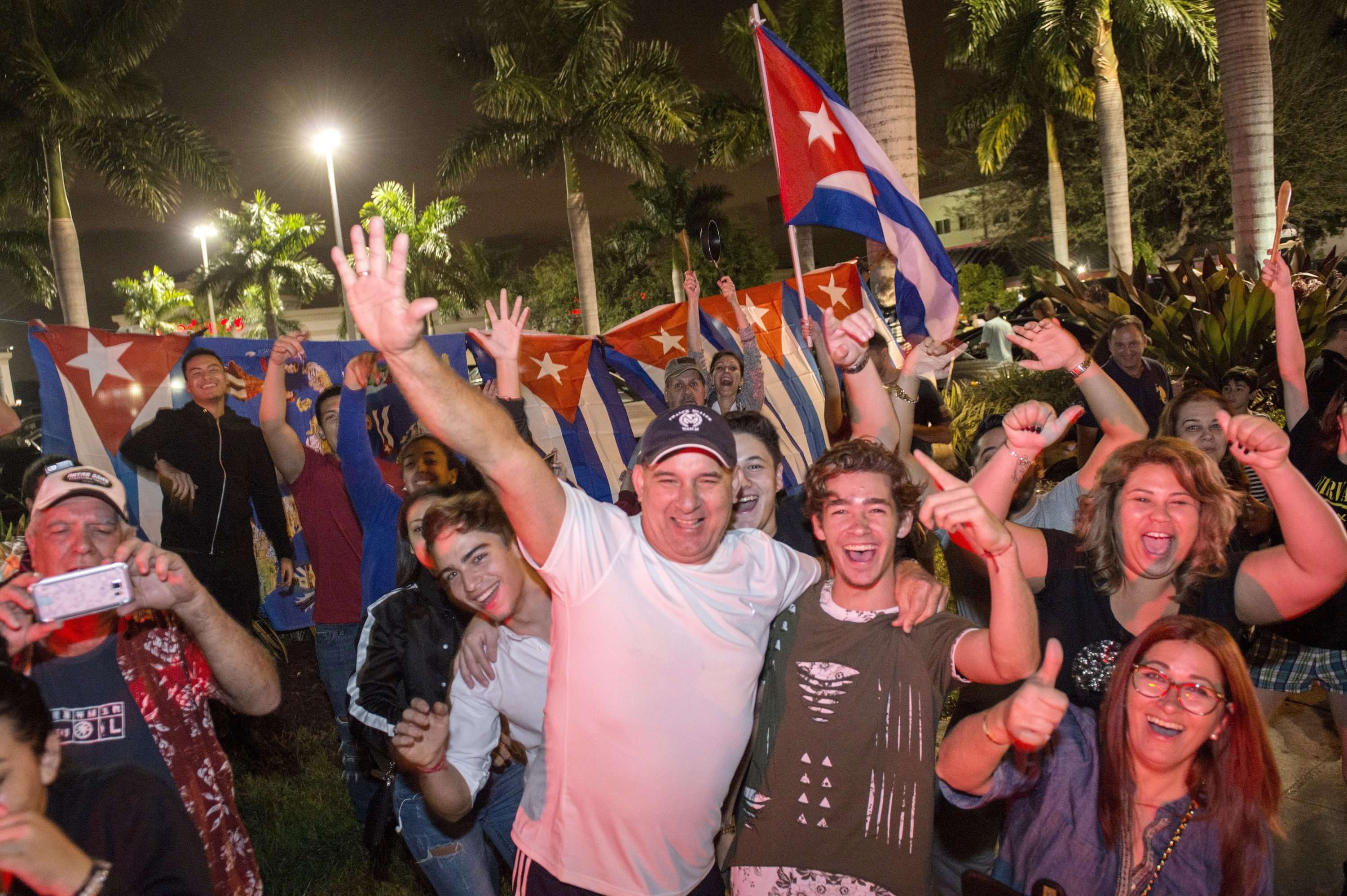 Members of the Cuban community of Miami celebrate the death of former Cuban president Fidel Castro. Photo: EPA