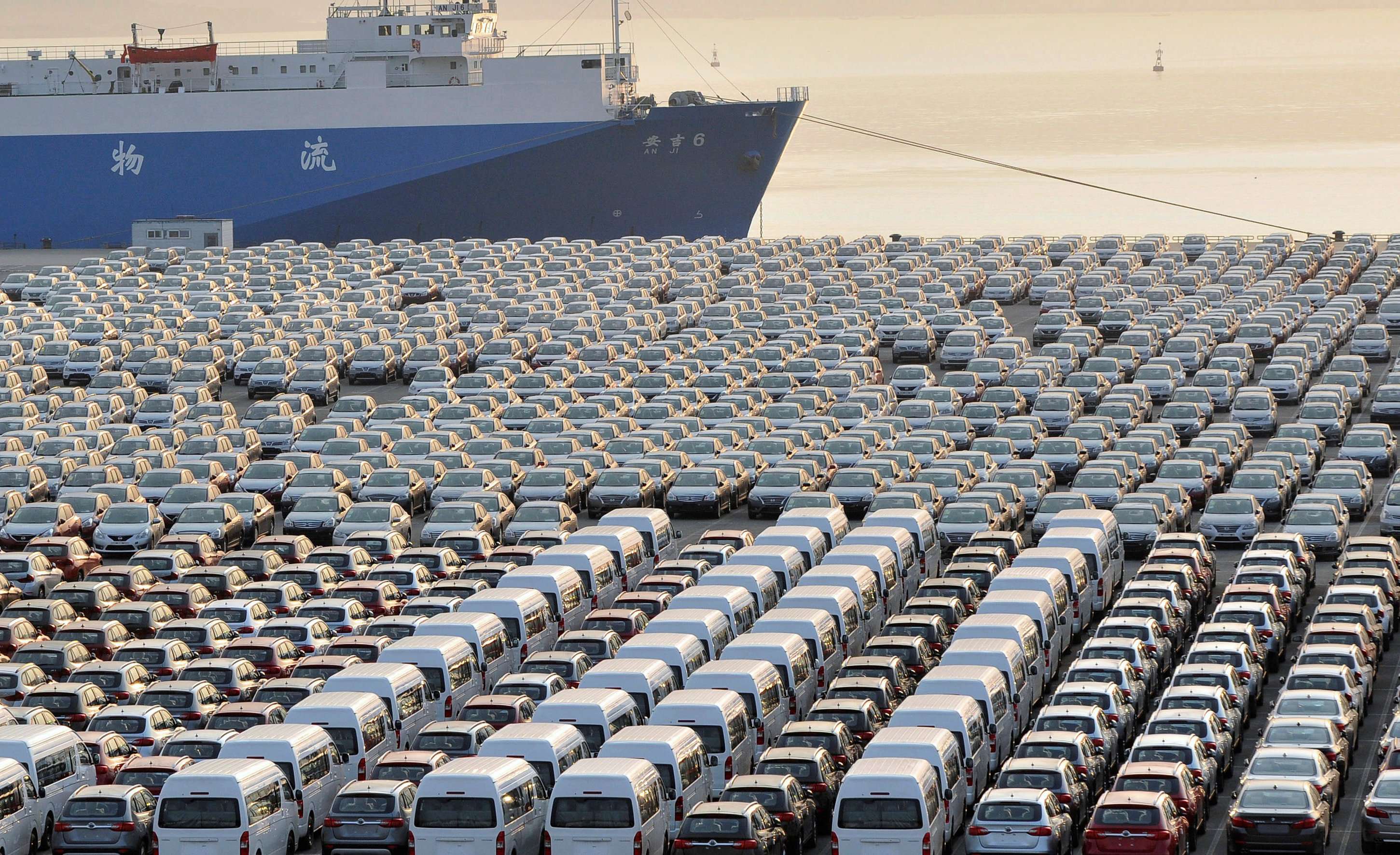 Chinese cars wait for export at a port in Dalian, Liaoning province in October. Reuters